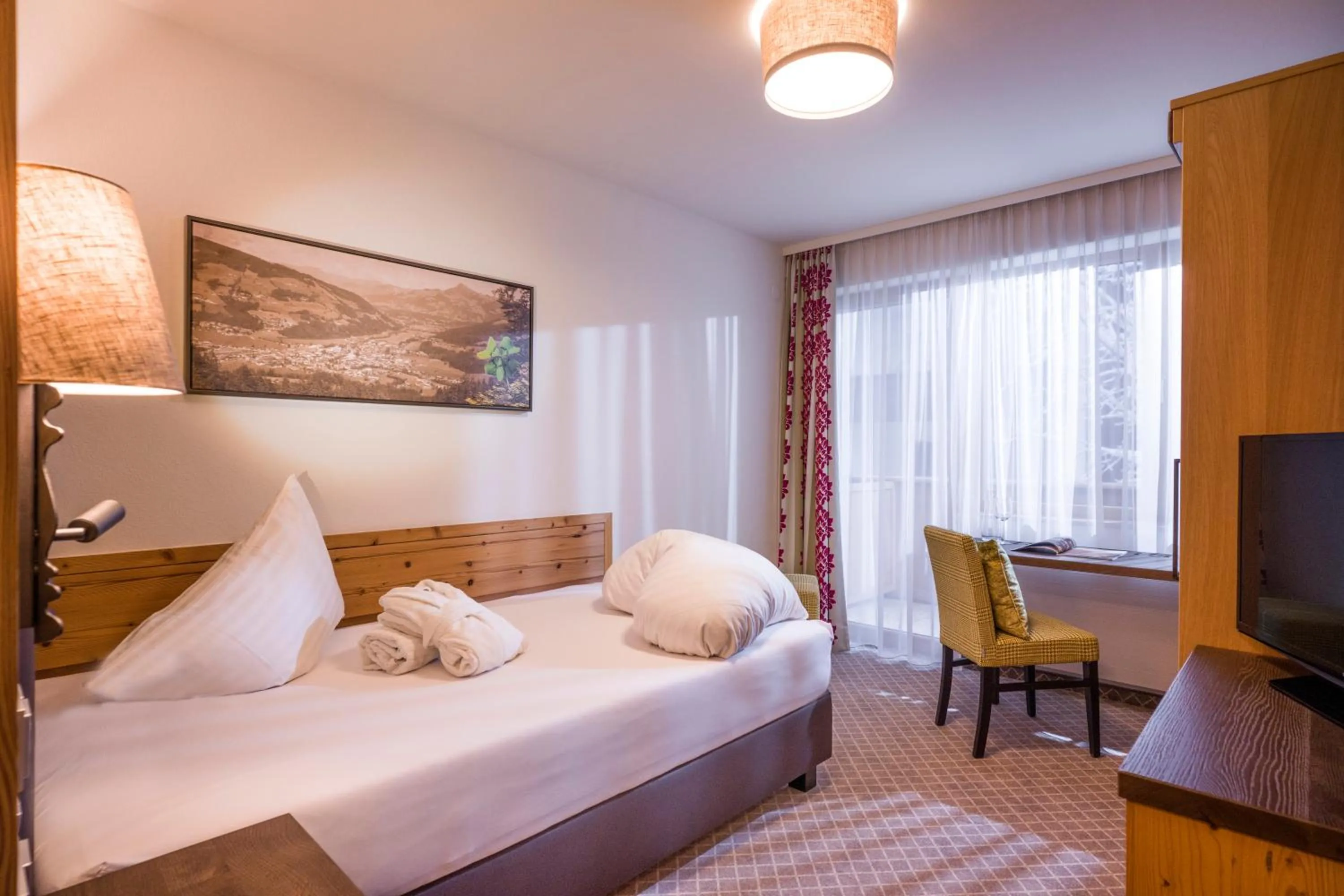 Photo of the whole room, Bed in Alpen Glück Hotel Kirchberger Hof