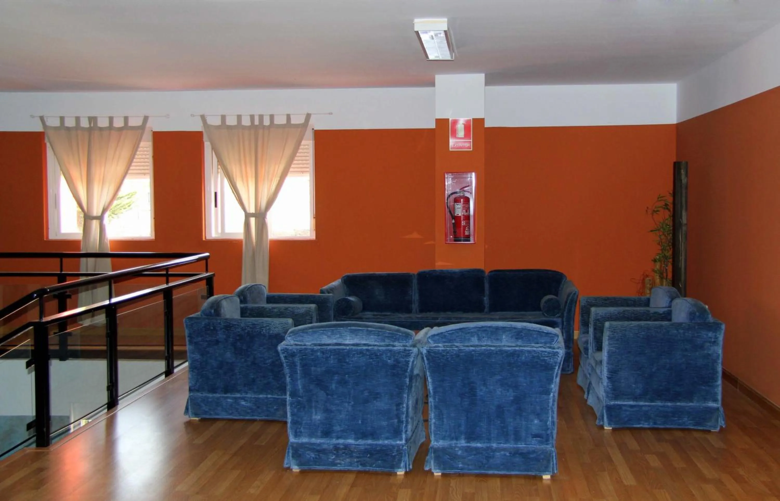 Communal lounge/ TV room in AHC Hoteles
