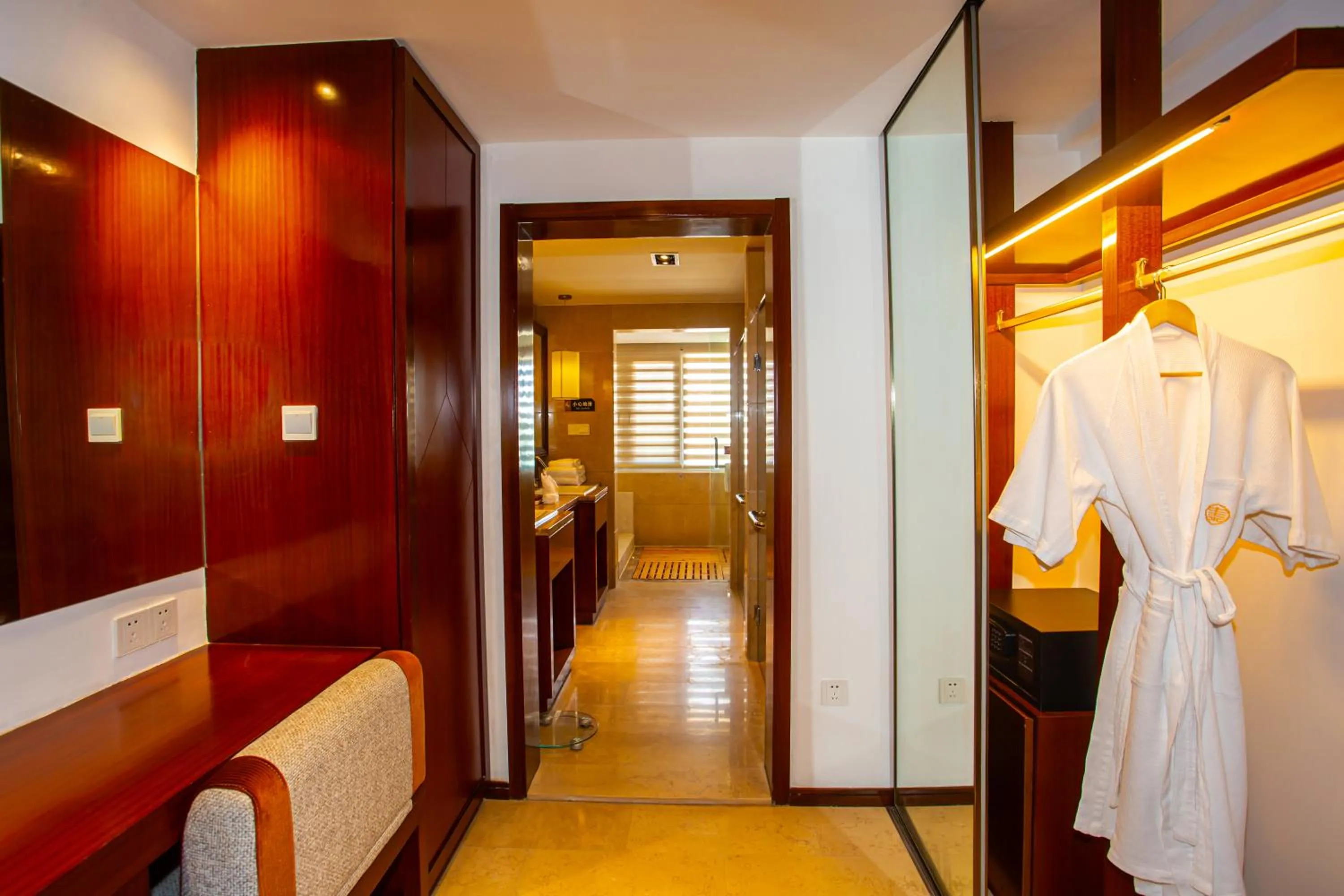 Bathroom in Ramada Encore by Wyndham Qionghai Downtown