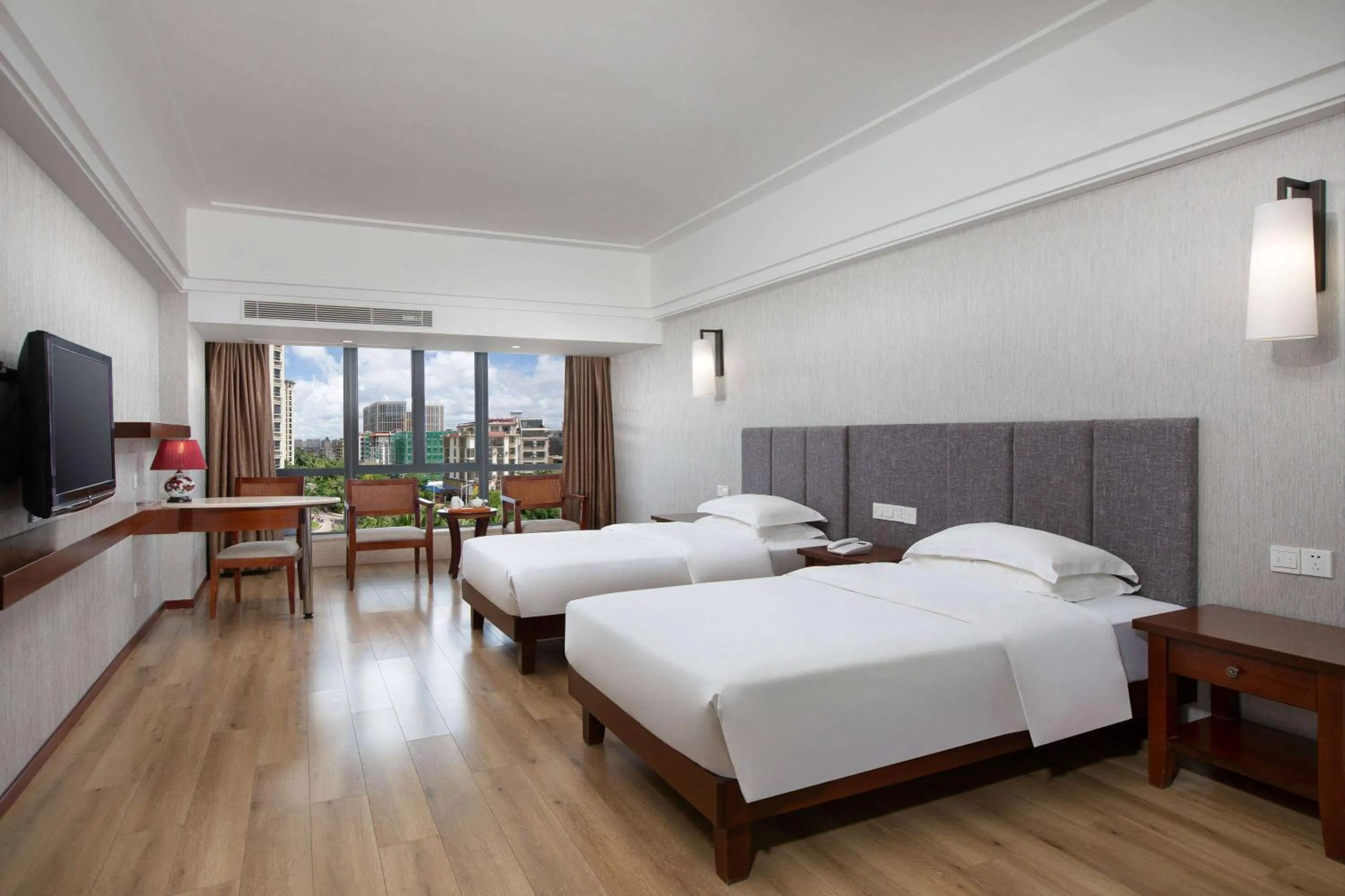 Photo of the whole room in Ramada Encore by Wyndham Qionghai Downtown