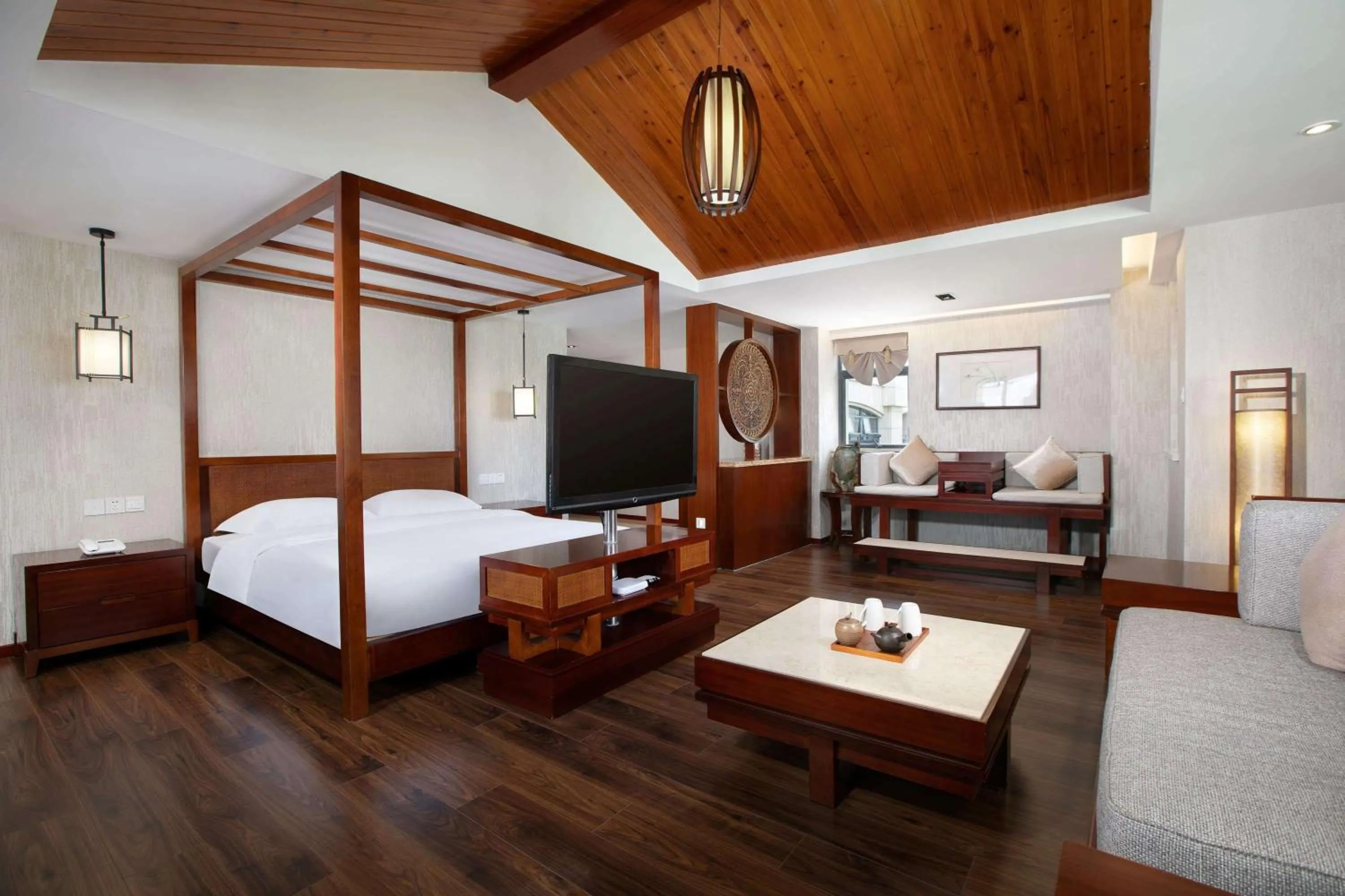 Photo of the whole room, TV/Entertainment Center in Ramada Encore by Wyndham Qionghai Downtown