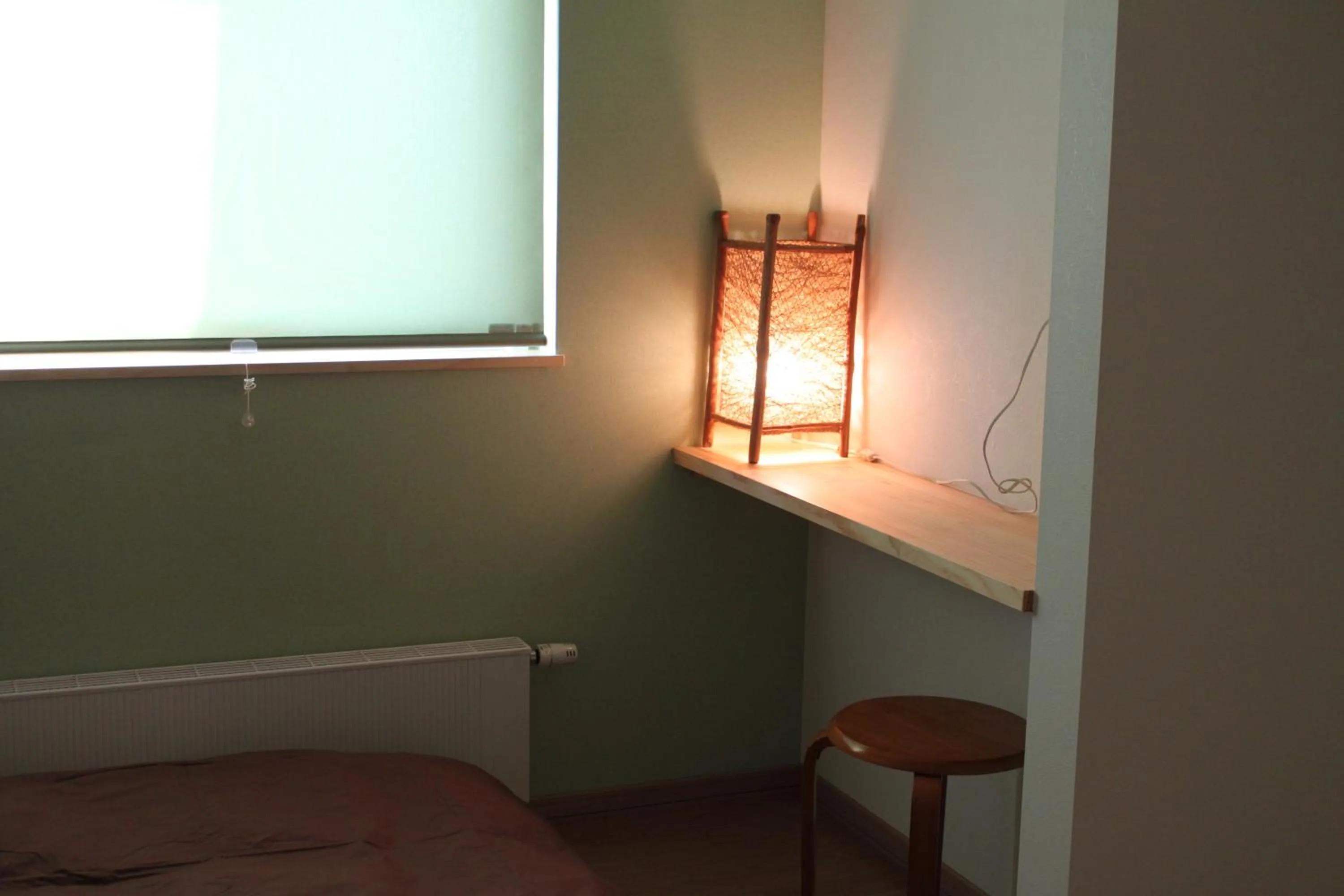 Bed in Niseko Guesthouse Nalu.