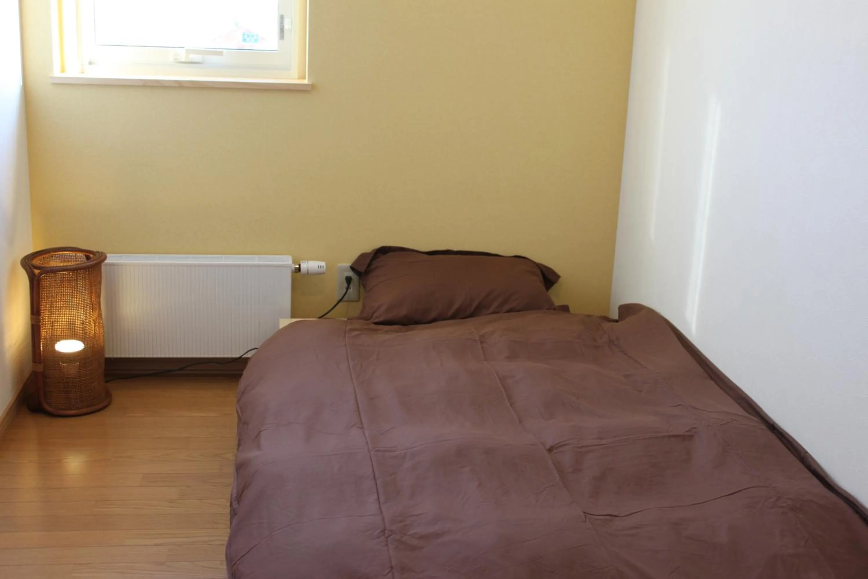 Bedroom, Bed in Niseko Guesthouse Nalu.