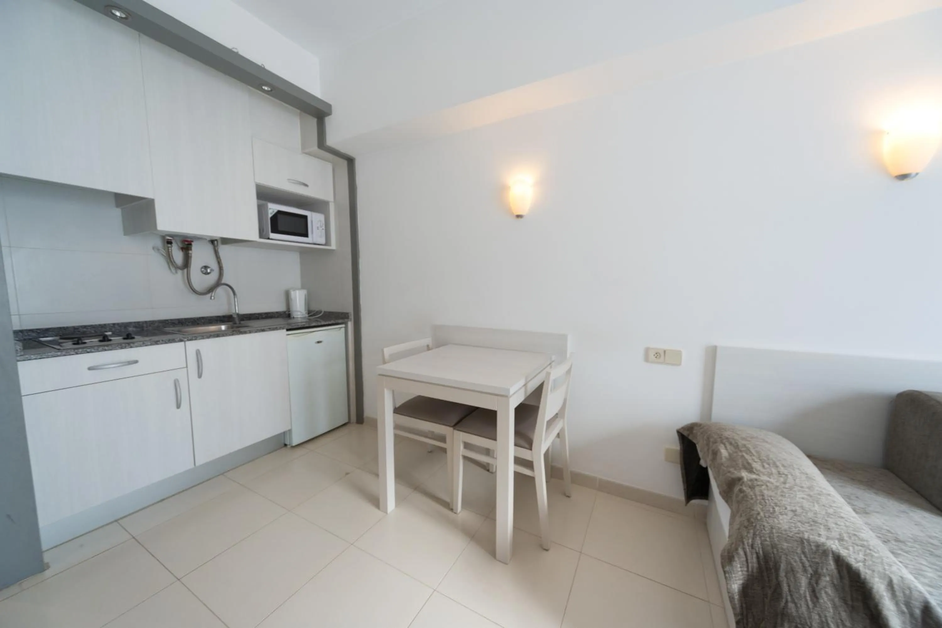Kitchen or kitchenette in Apartamentos Embat