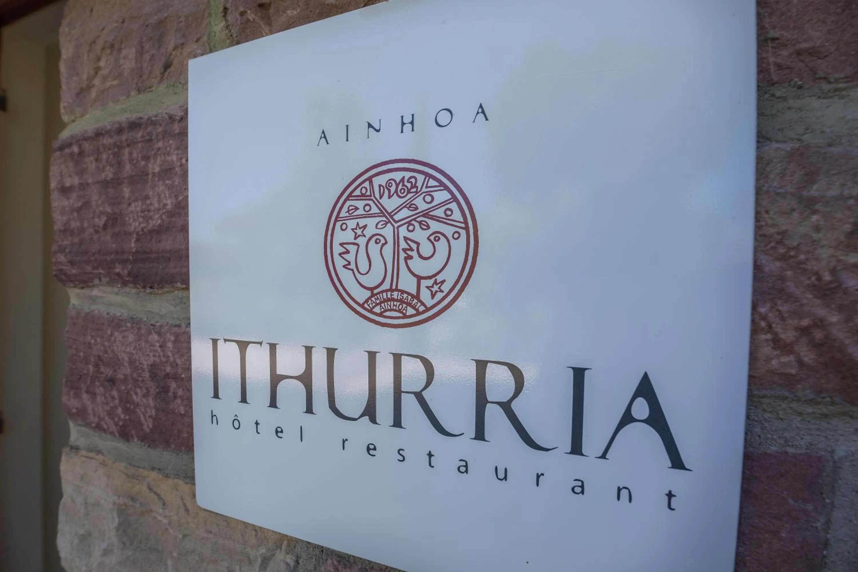 Property logo or sign in Hôtel Ithurria - Teritoria