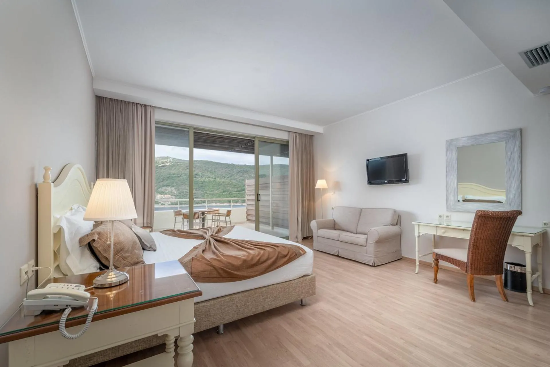 Bed in San Nicolas Resort Hotel