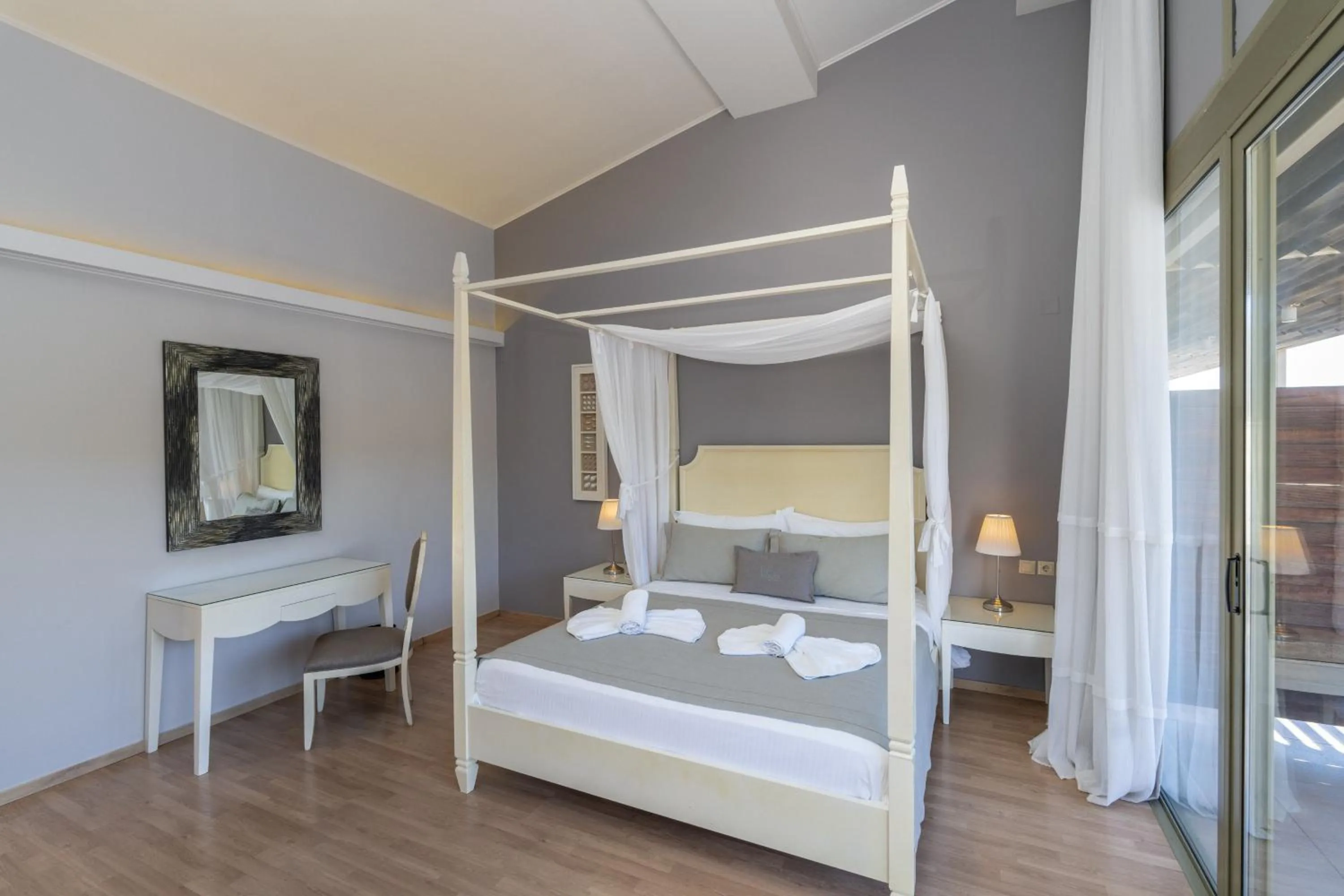 Bed in San Nicolas Resort Hotel