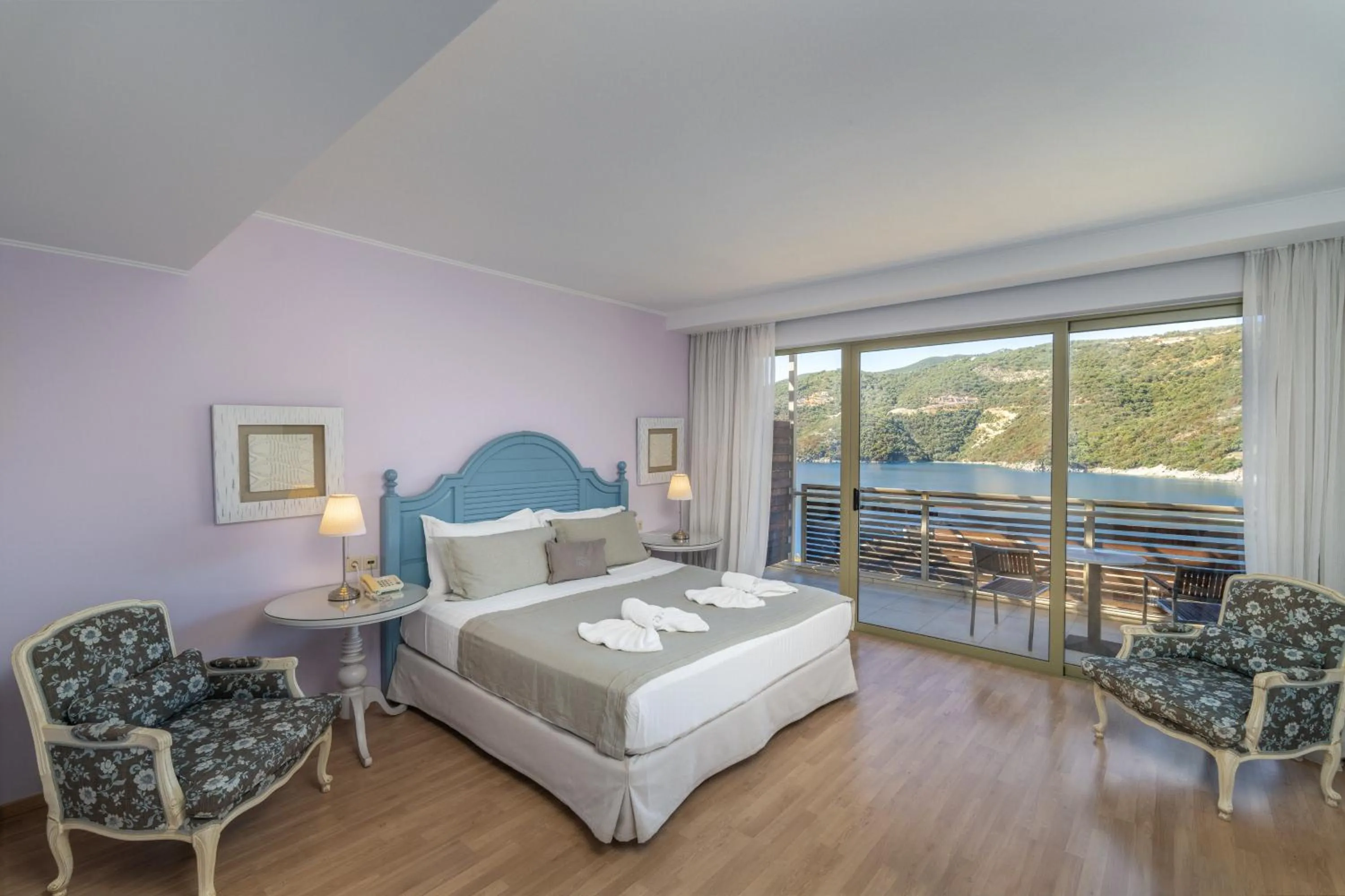 Bed in San Nicolas Resort Hotel