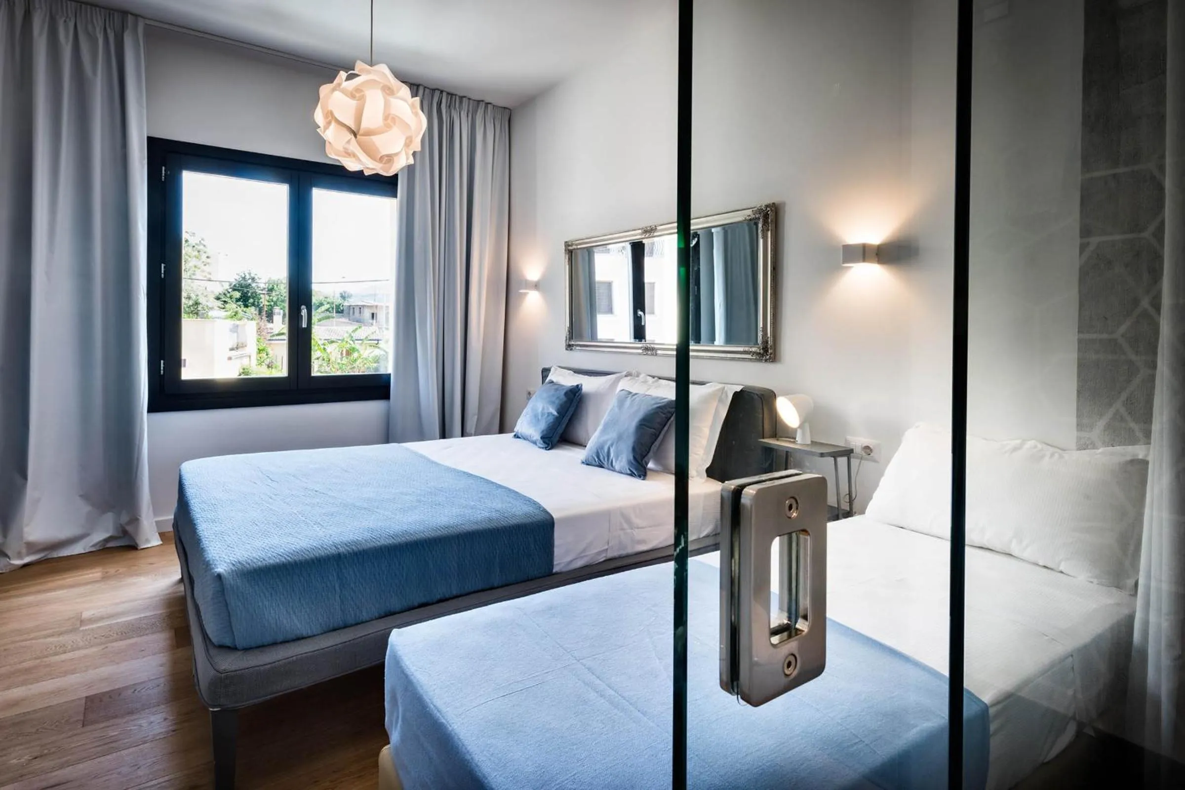 Bedroom in Teku Sardinia Boutique Hotel