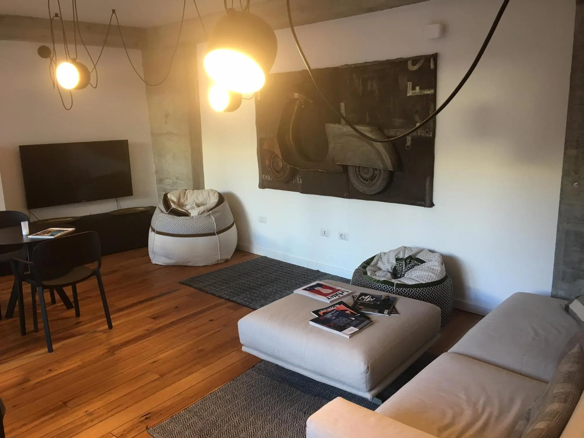 Communal lounge/ TV room in Teku Sardinia Boutique Hotel