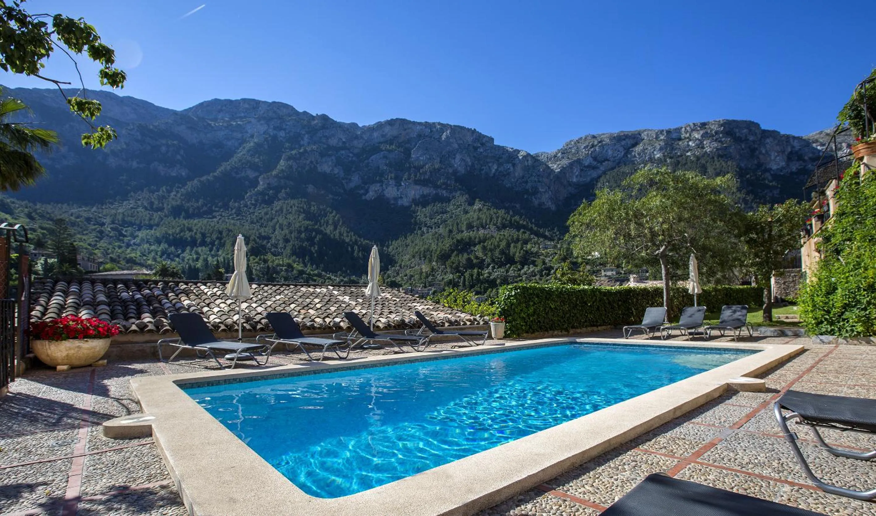 Swimming pool in Hotel y Apartamentos DES PUIG