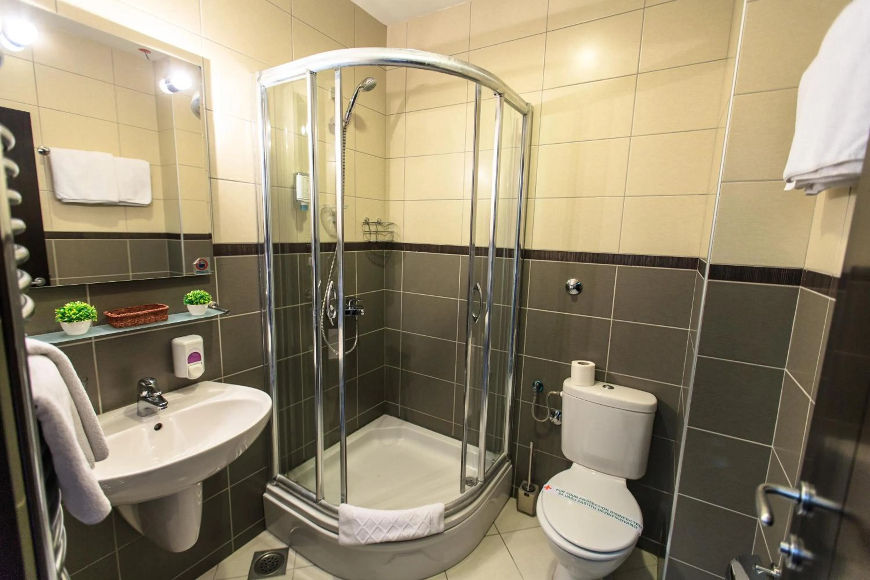 Bathroom in Lucic Rooms & Suites