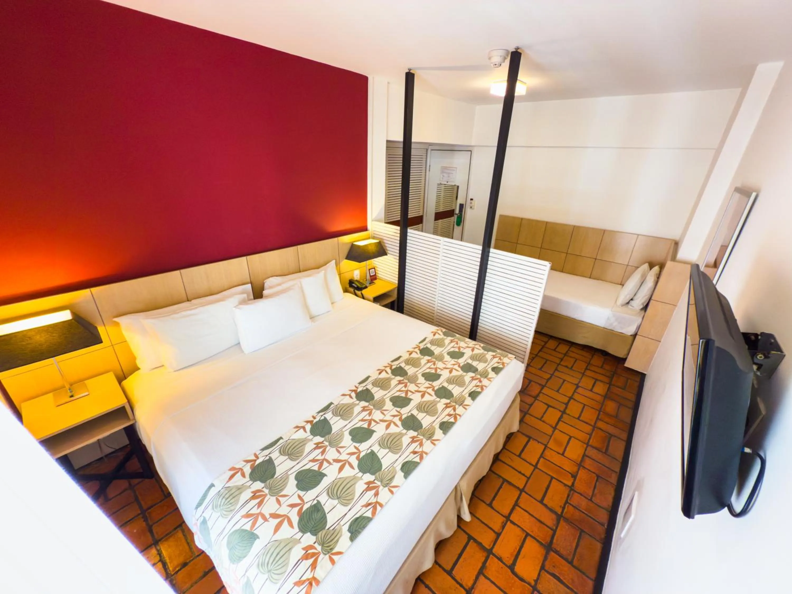 Bed in Ferraretto Guarujá Hotel & Spa