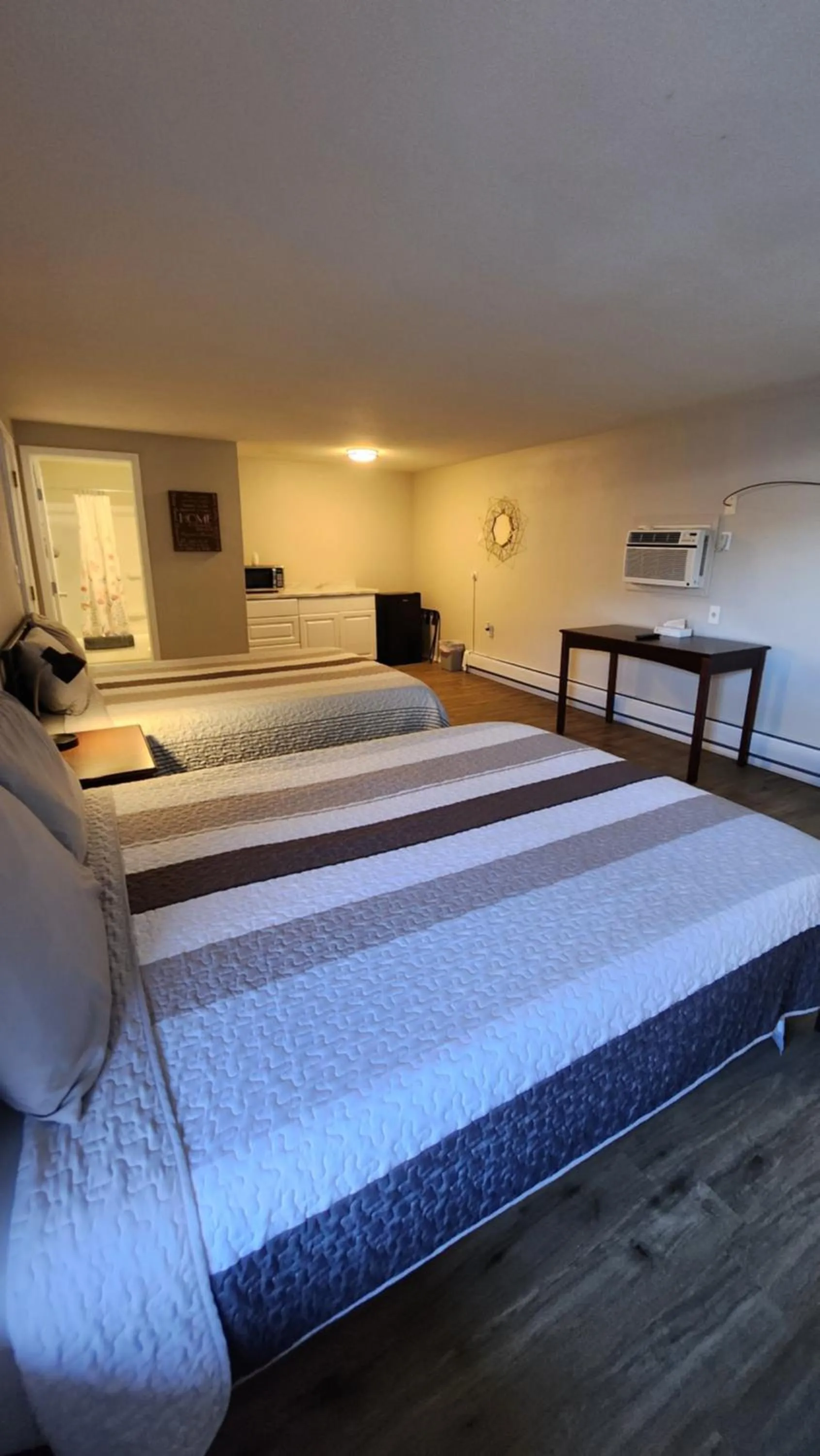 Bed in Golden Arrow Motel