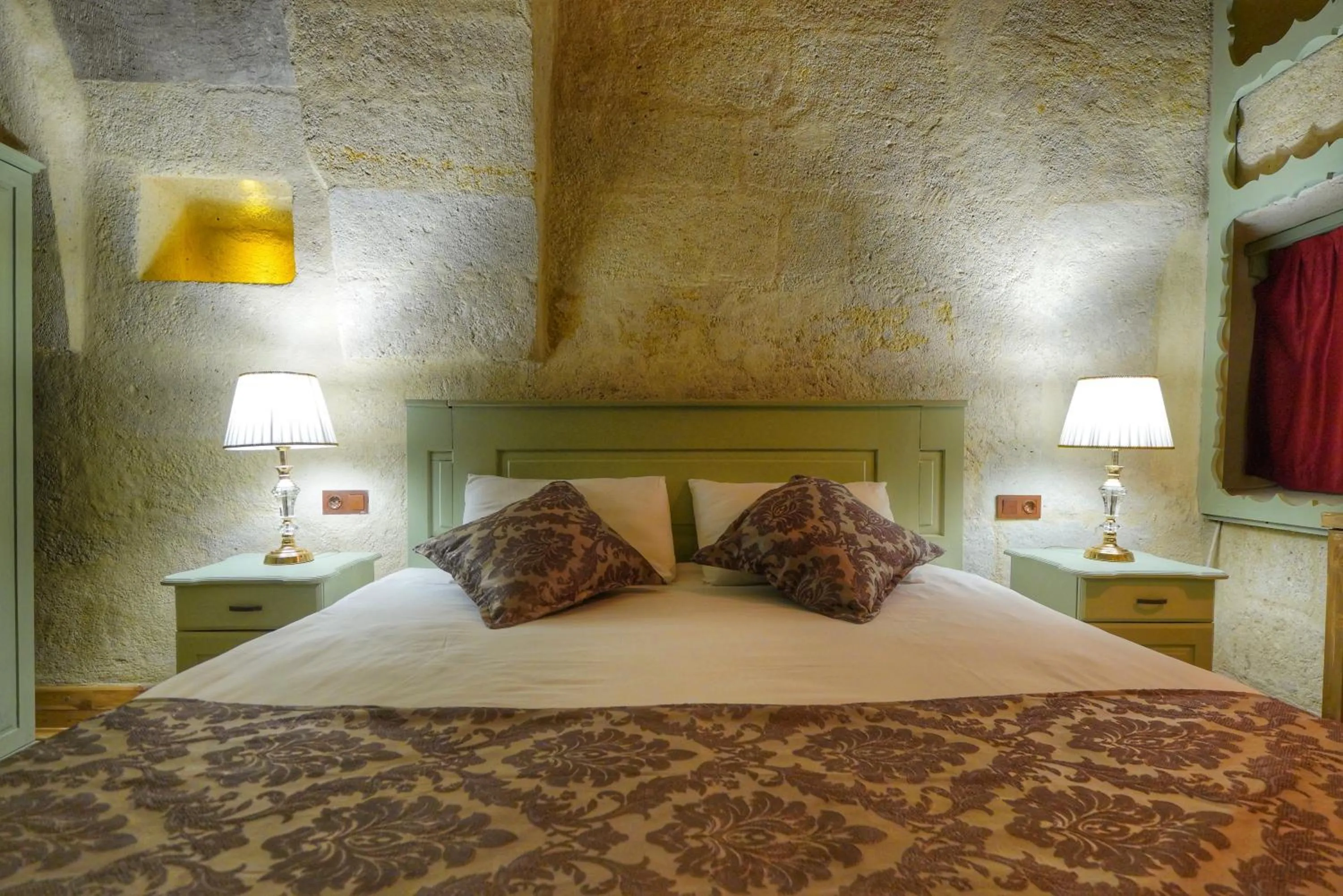 Bed in Takaev Cave House