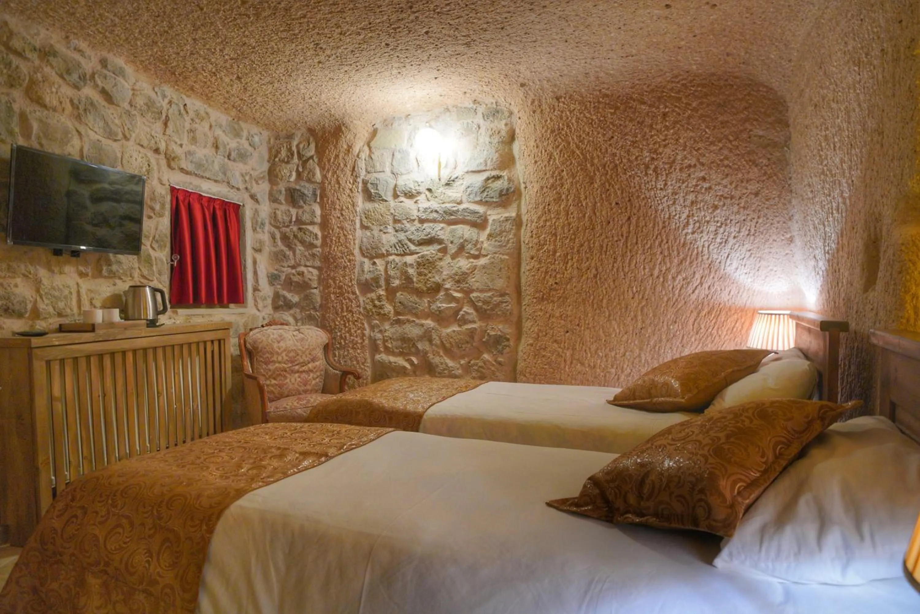 Bed in Takaev Cave House