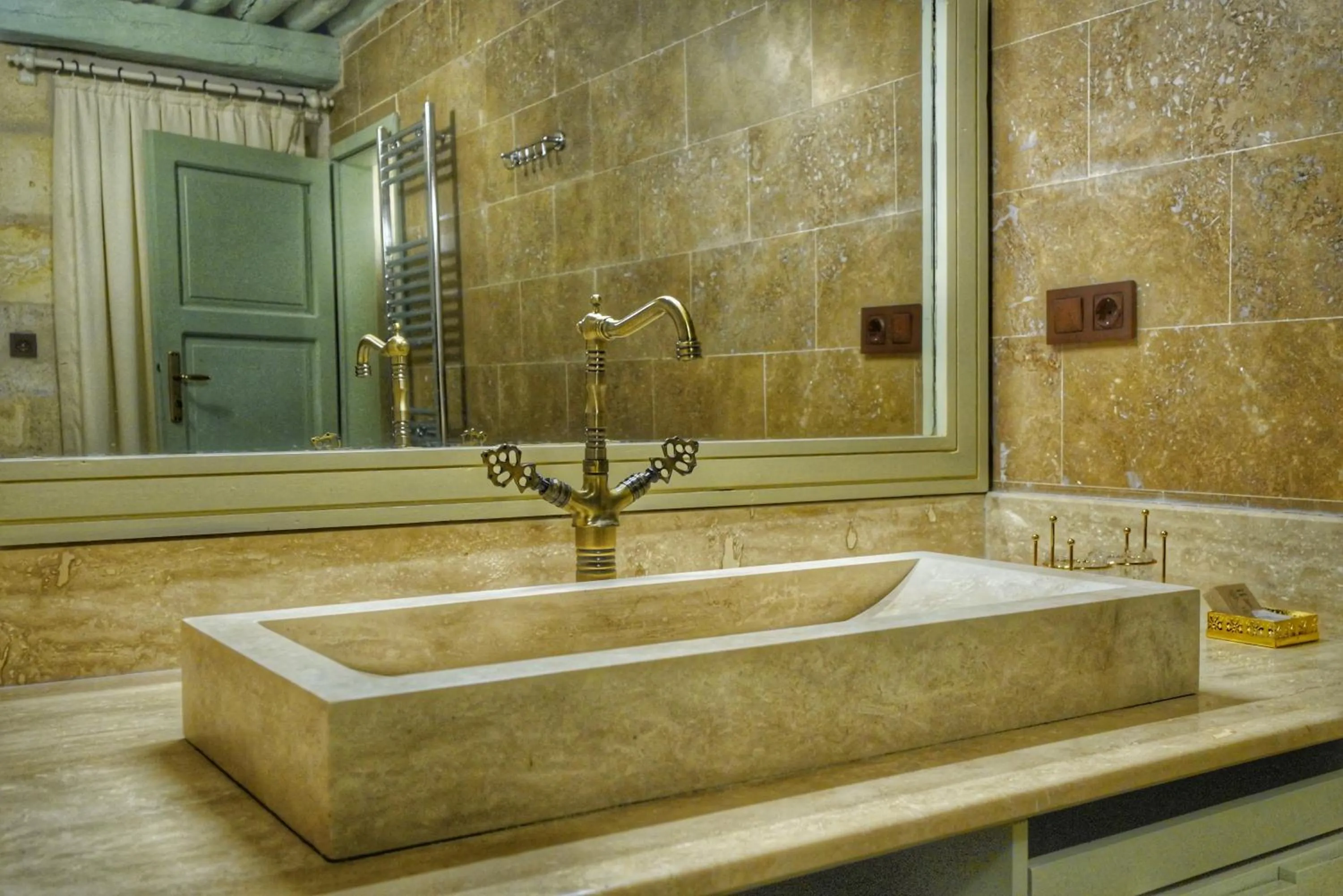 Bathroom in Takaev Cave House