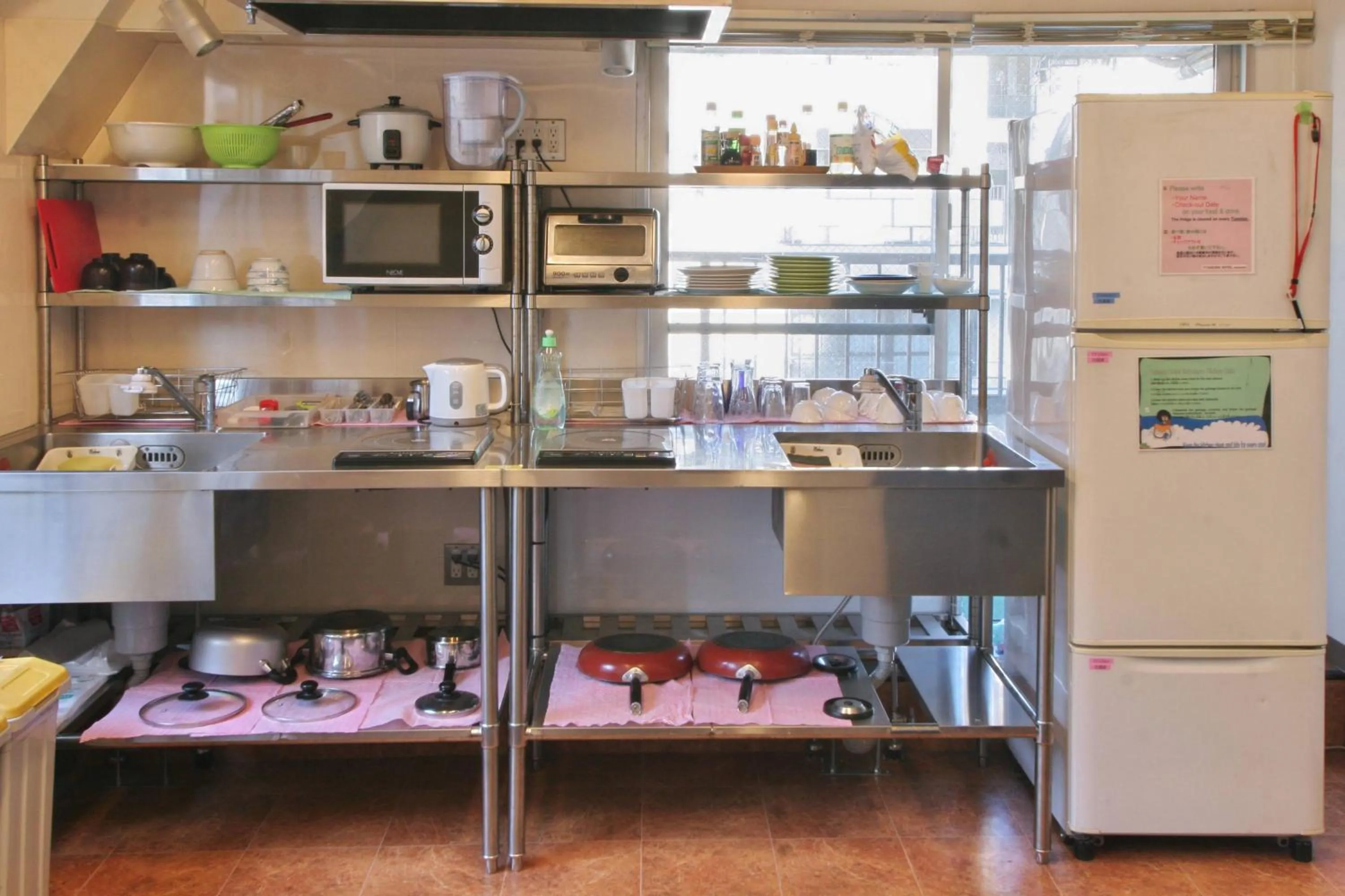 Kitchen or kitchenette in Sakura Hotel Ikebukuro