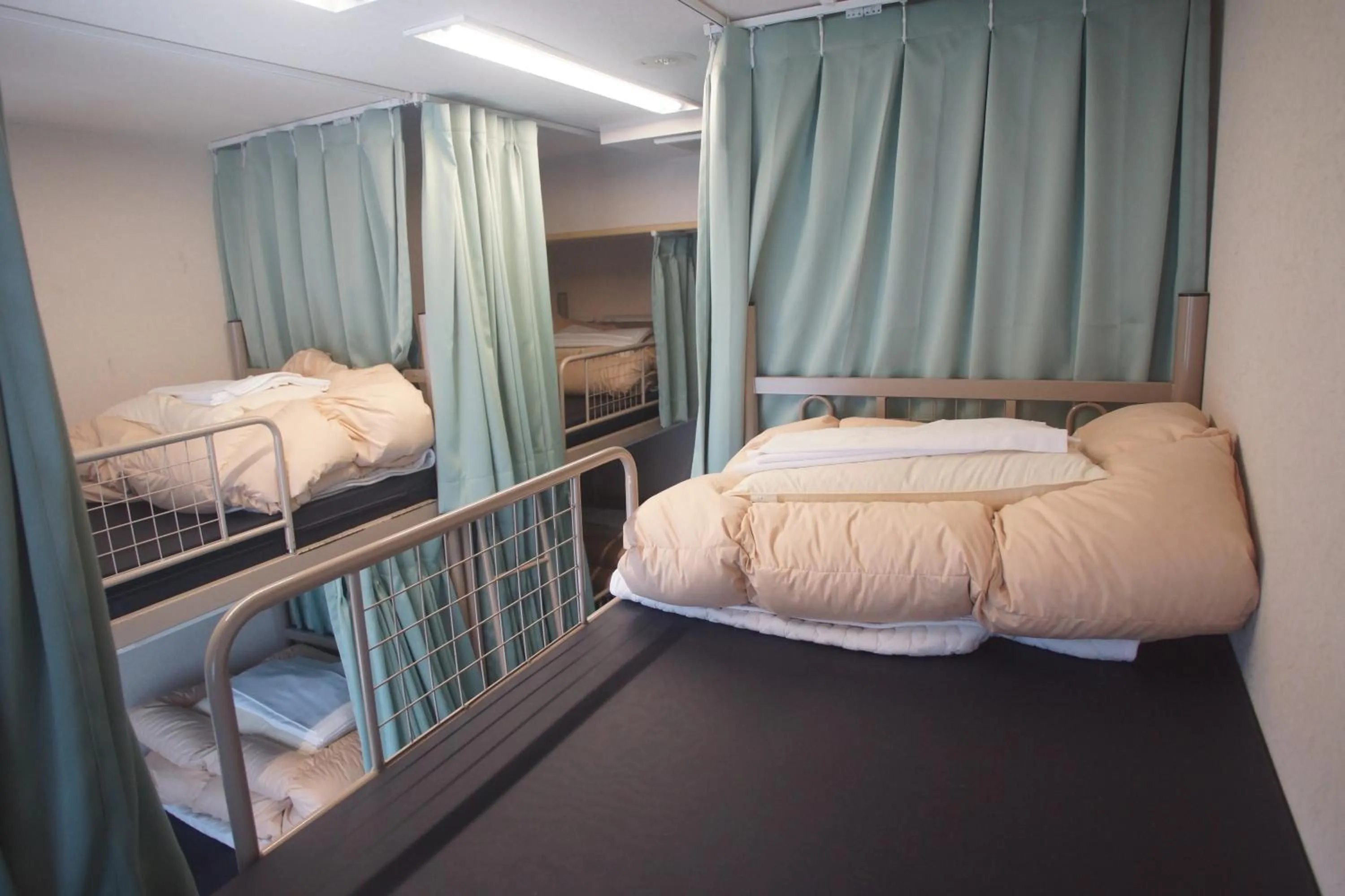 Bed in Sakura Hotel Ikebukuro