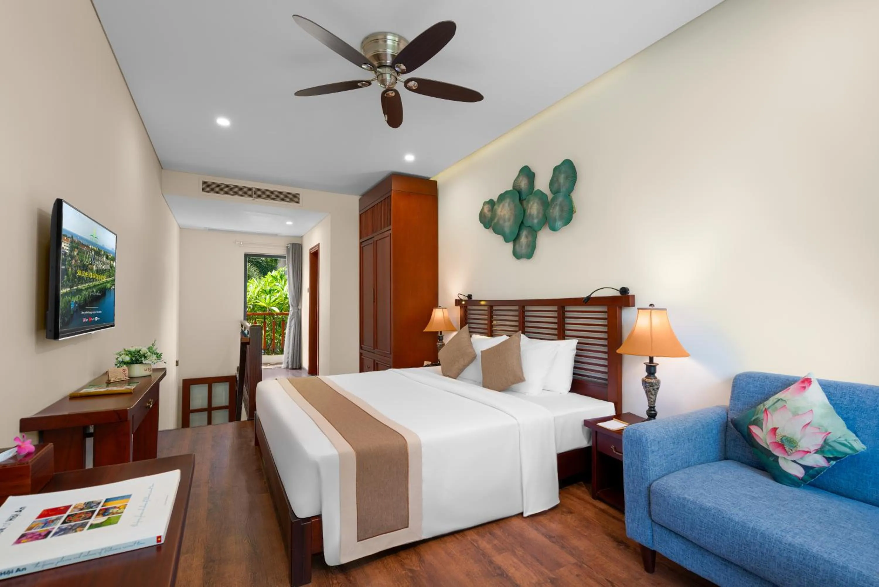 Bed in Silk Sense Hoi An River Resort - Green Luxury Escape