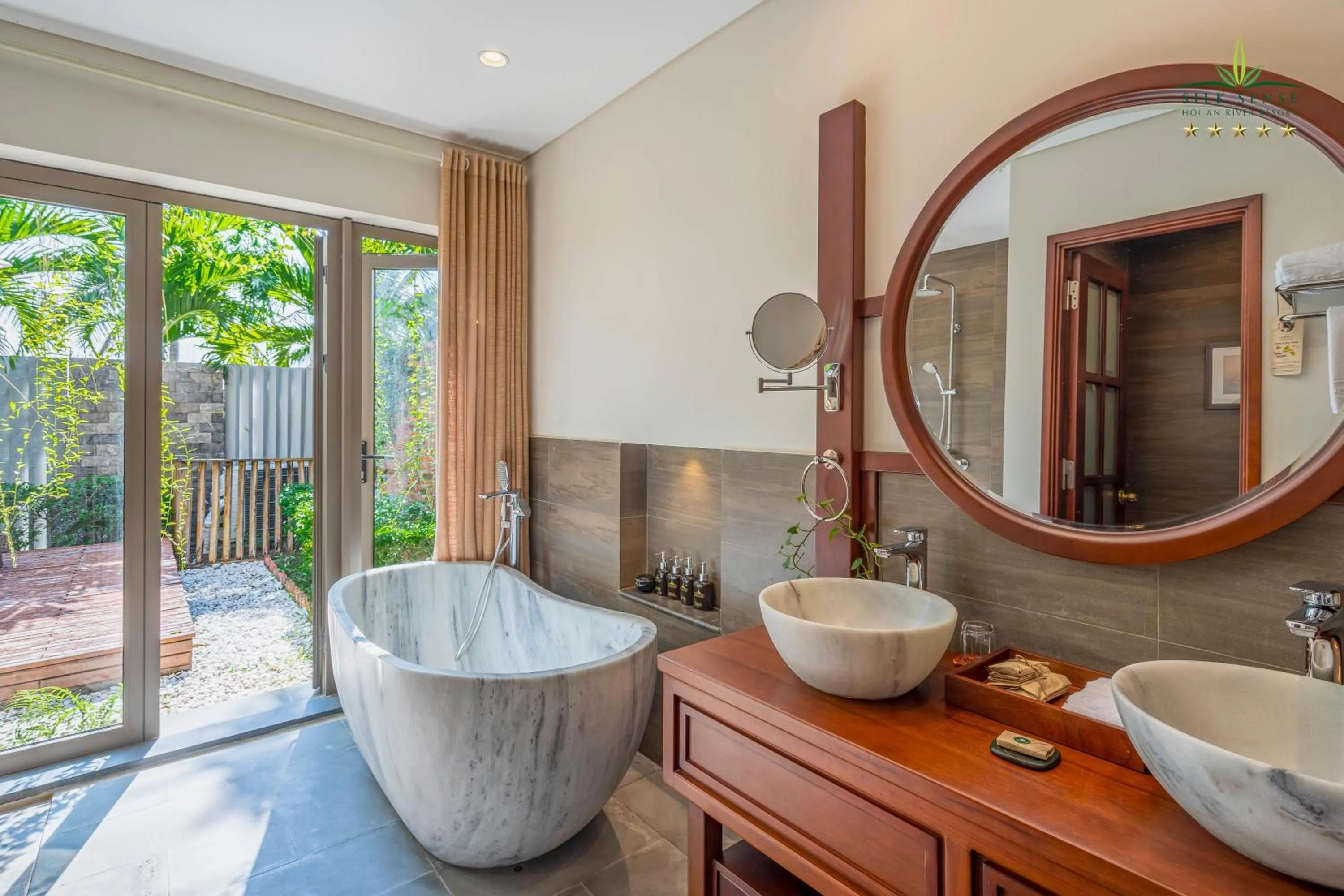 Bathroom in Silk Sense Hoi An River Resort - Green Luxury Escape