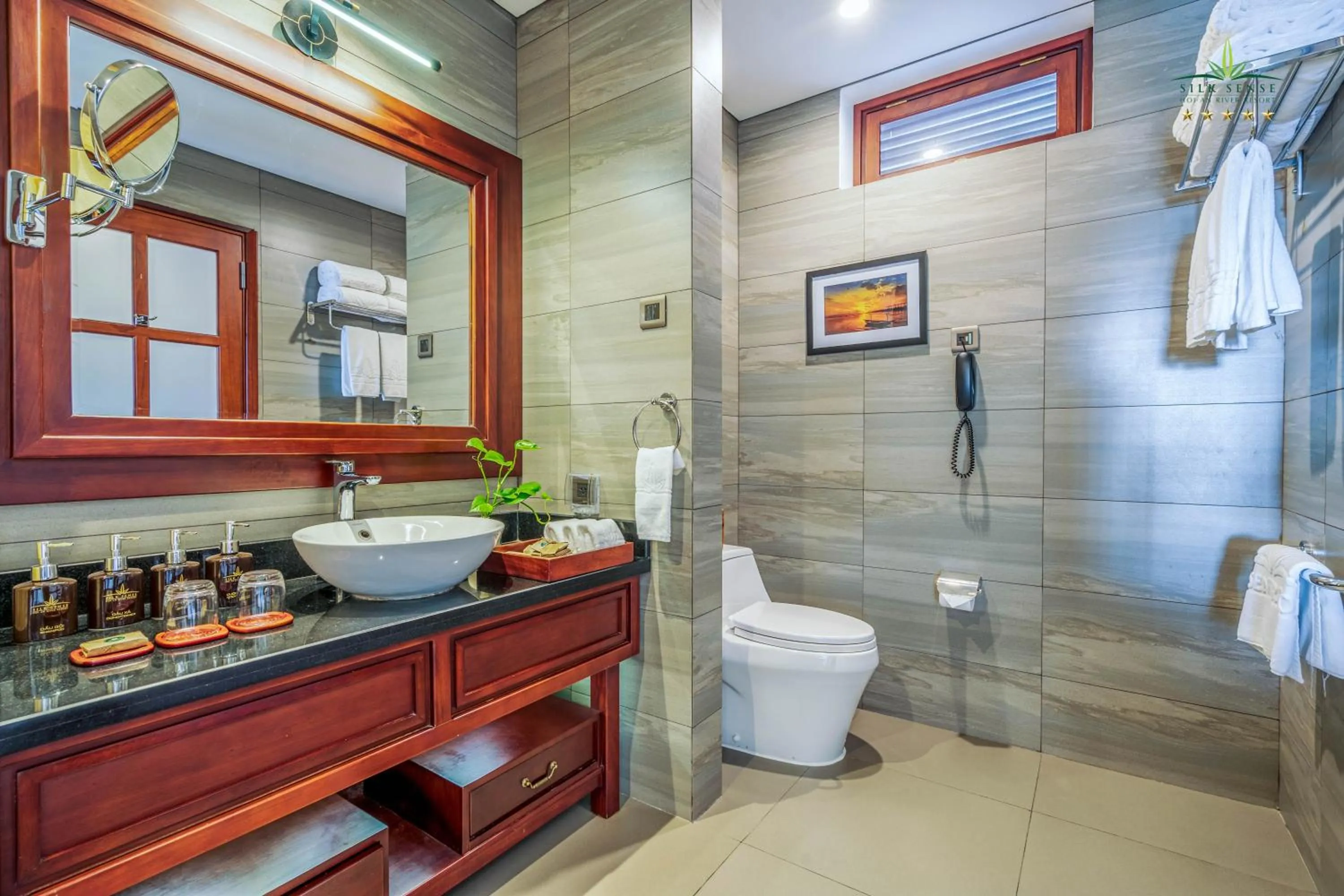 Bathroom in Silk Sense Hoi An River Resort - Green Luxury Escape