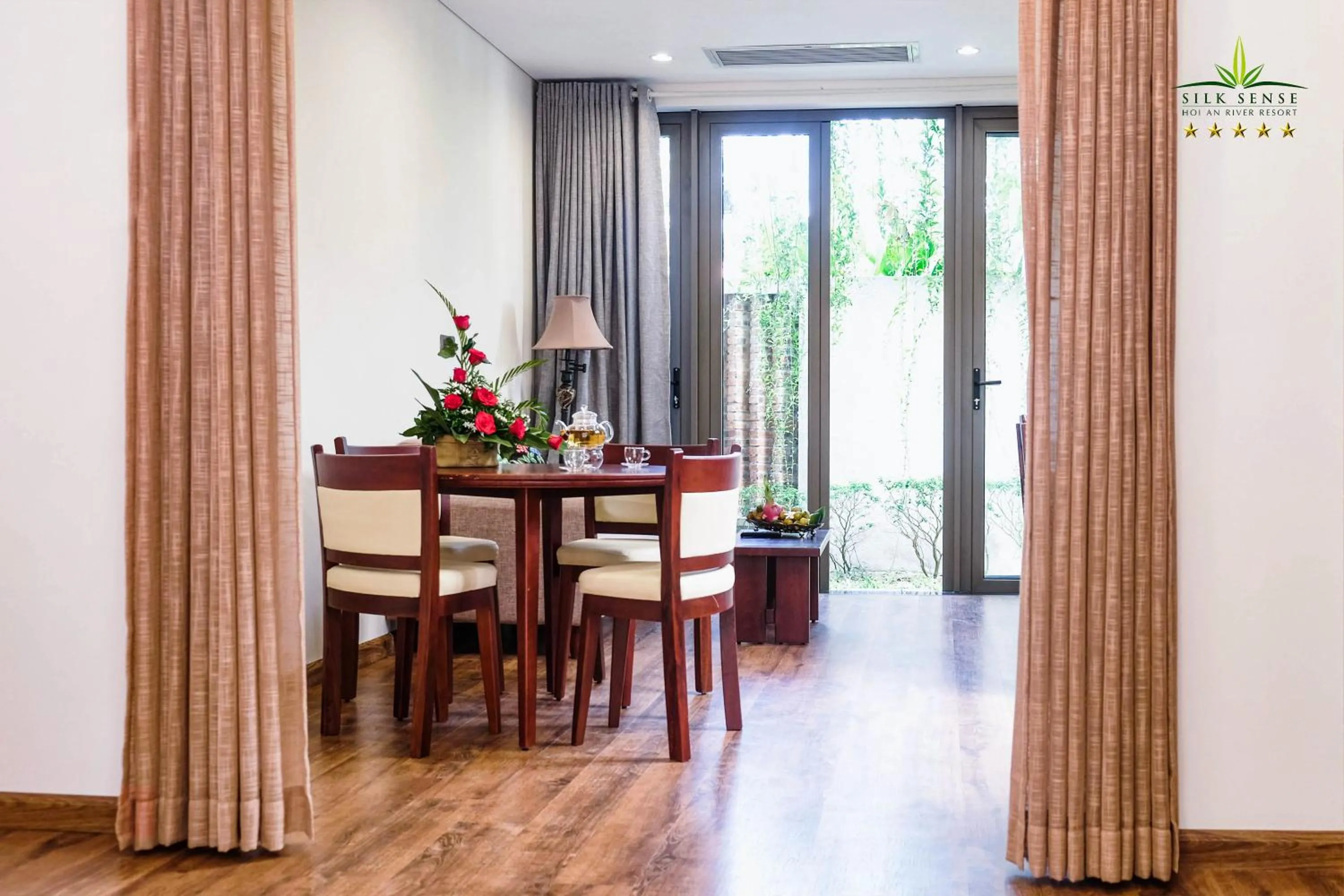 Living room in Silk Sense Hoi An River Resort - Green Luxury Escape