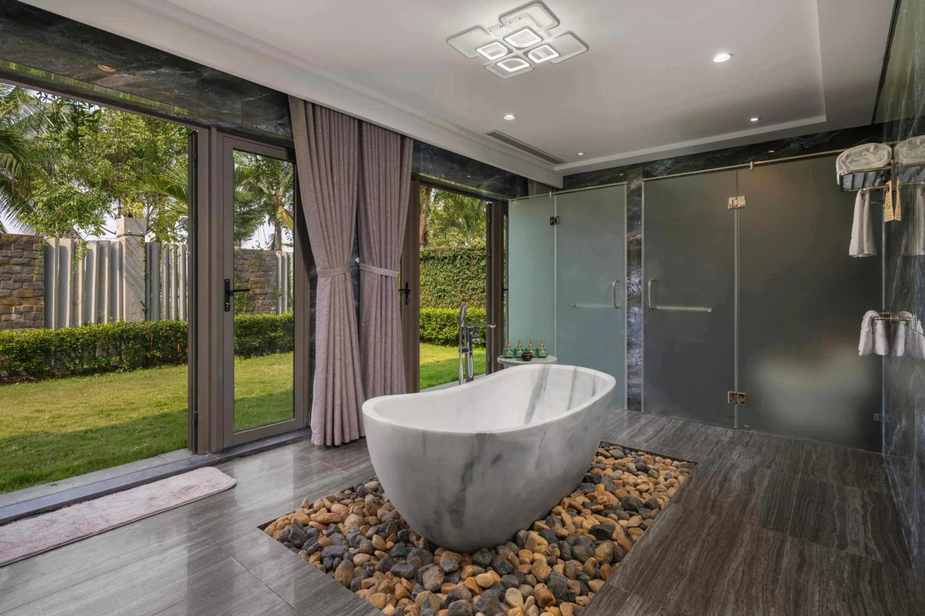 Bathroom in Silk Sense Hoi An River Resort - Green Luxury Escape