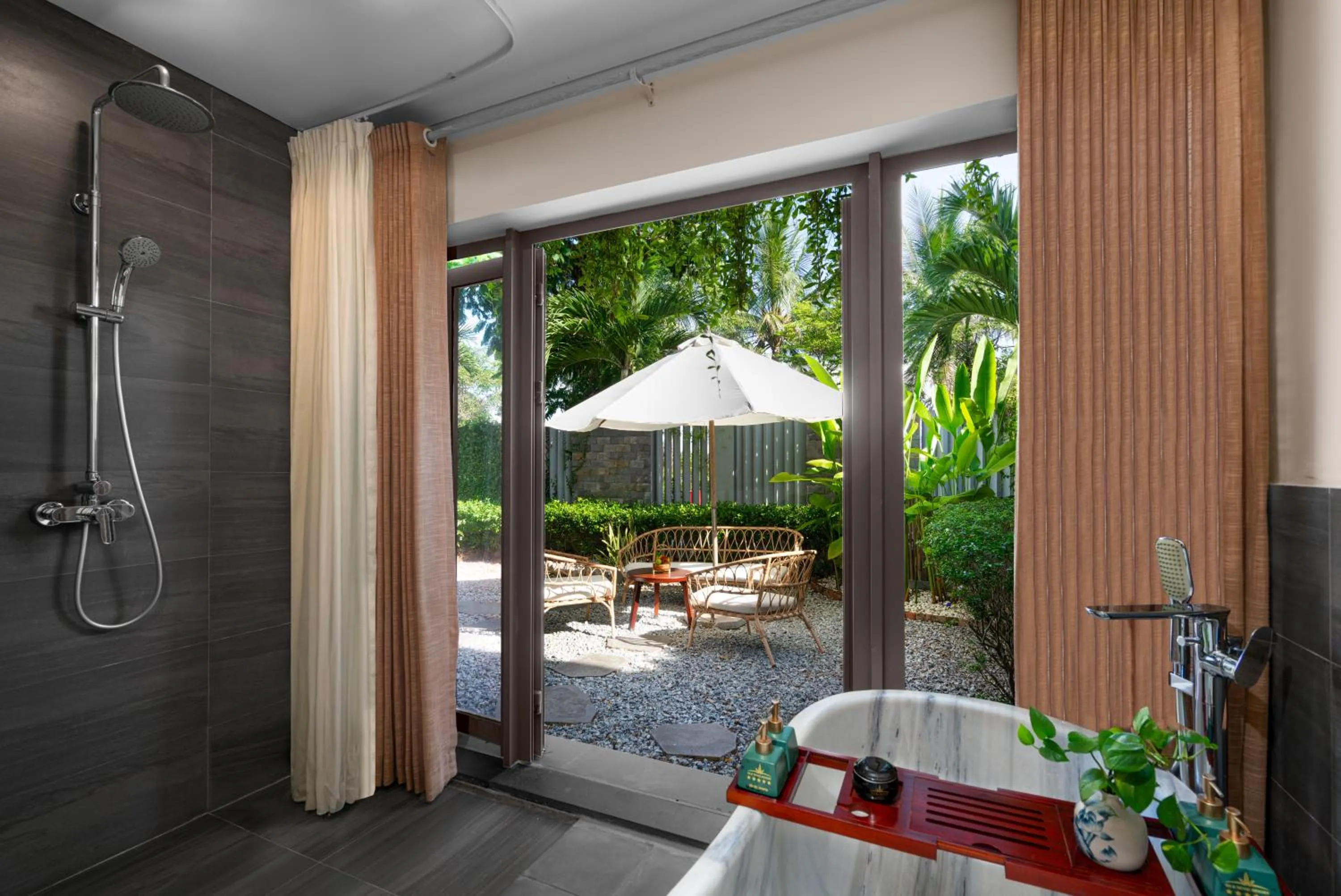 Bathroom in Silk Sense Hoi An River Resort - Green Luxury Escape