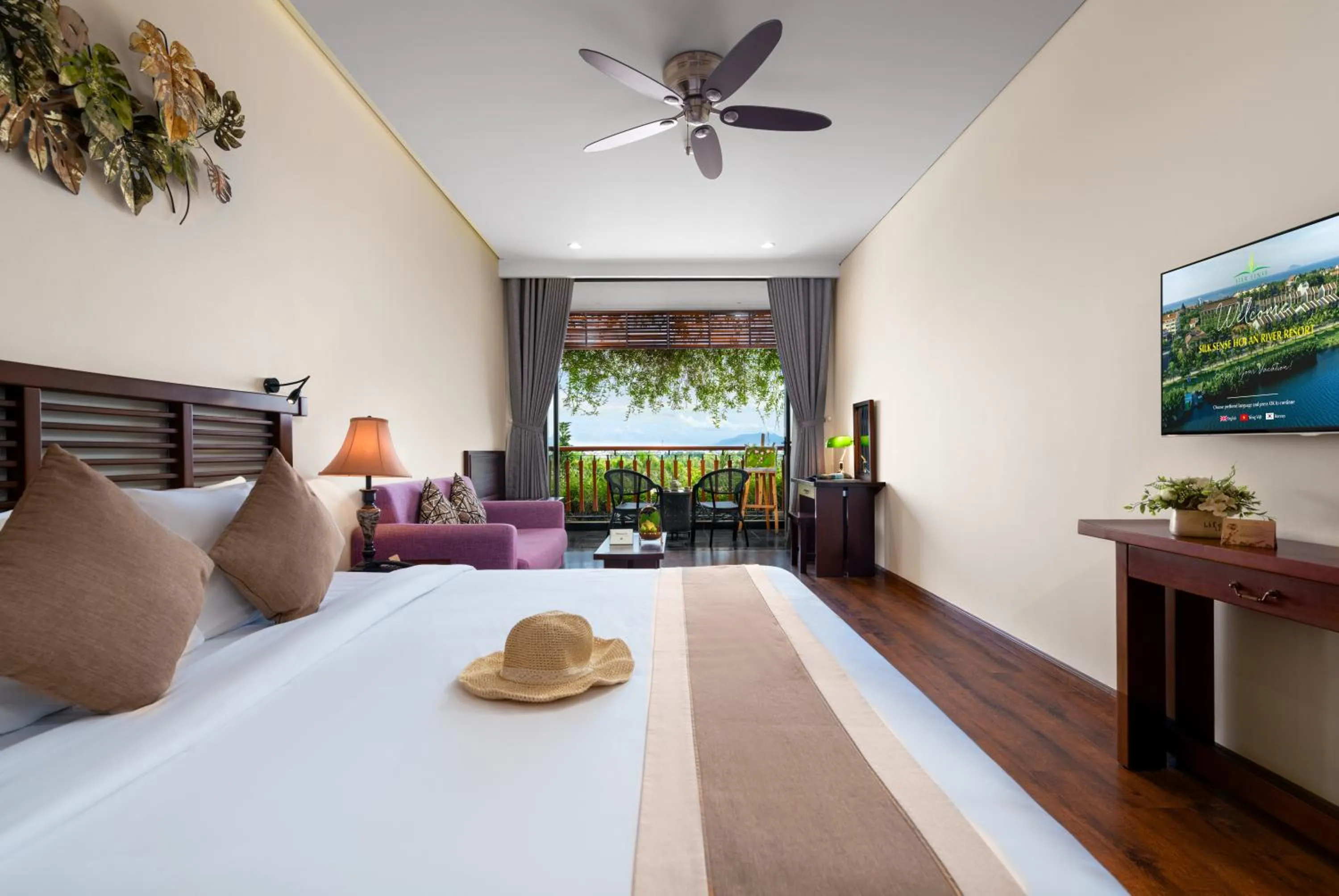 Bed in Silk Sense Hoi An River Resort - Green Luxury Escape