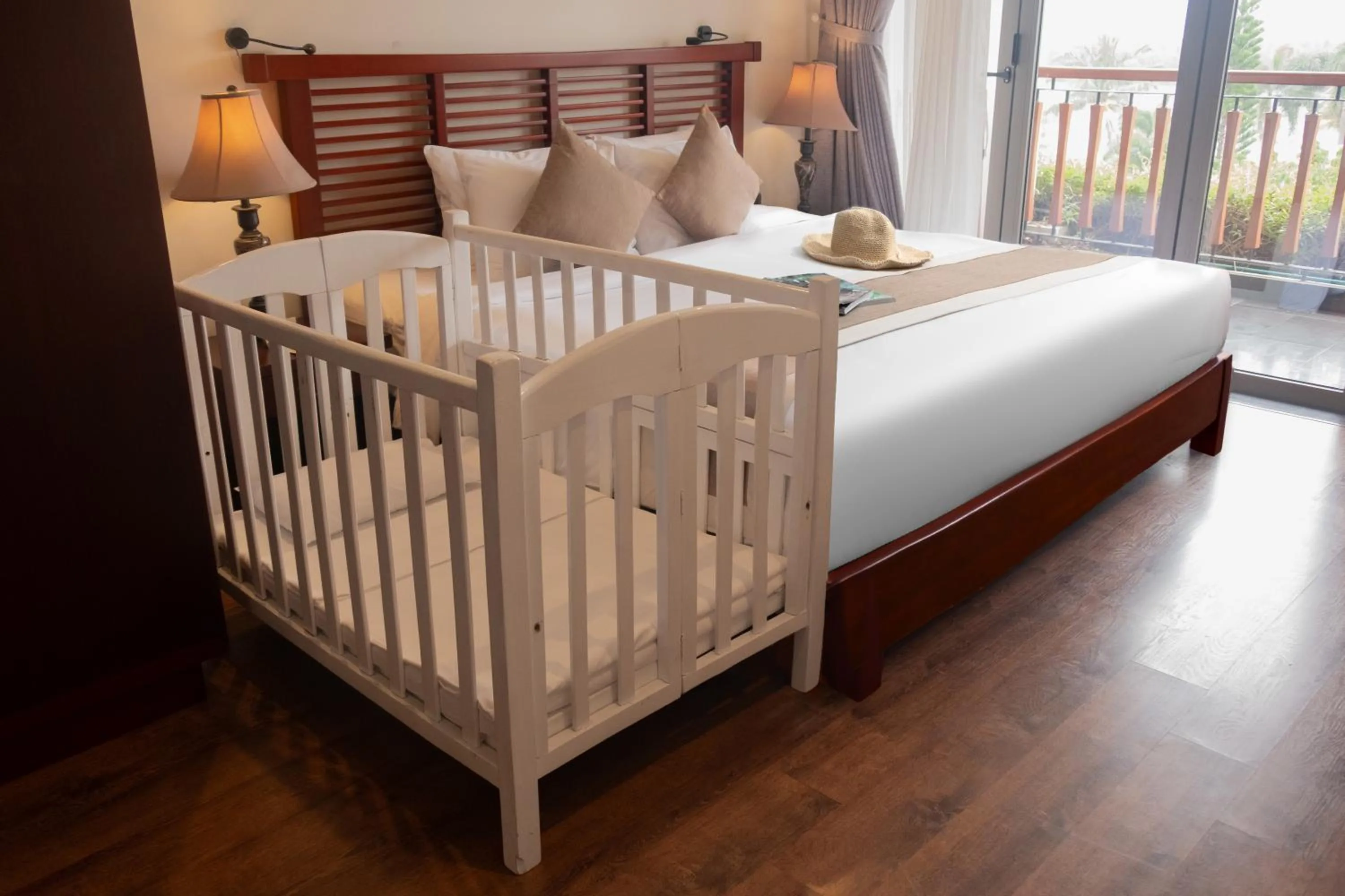 Bed in Silk Sense Hoi An River Resort - Green Luxury Escape