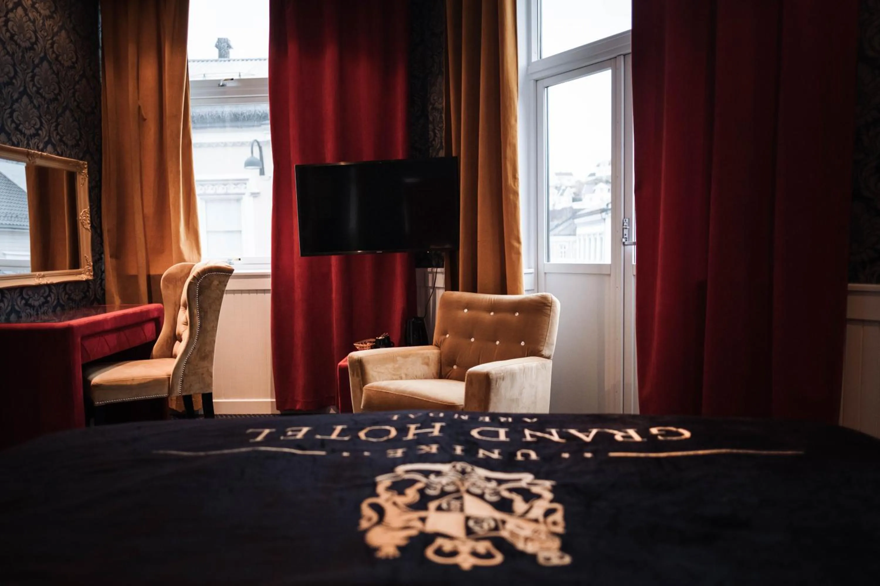 Photo of the whole room in Grand Hotel Arendal - Unike Hoteller