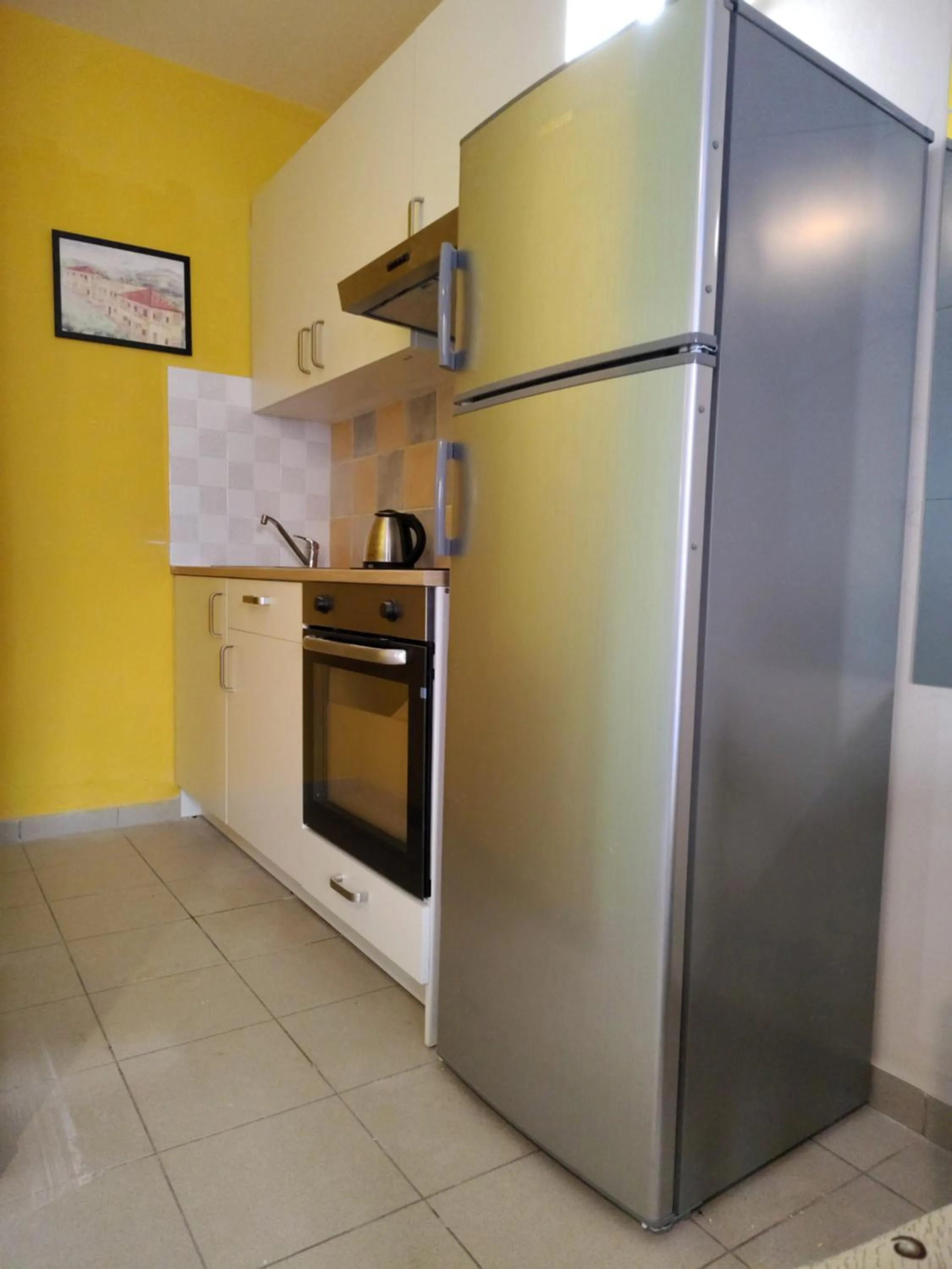 Kitchen or kitchenette in Mythos- Platanias- Hotel -Apts