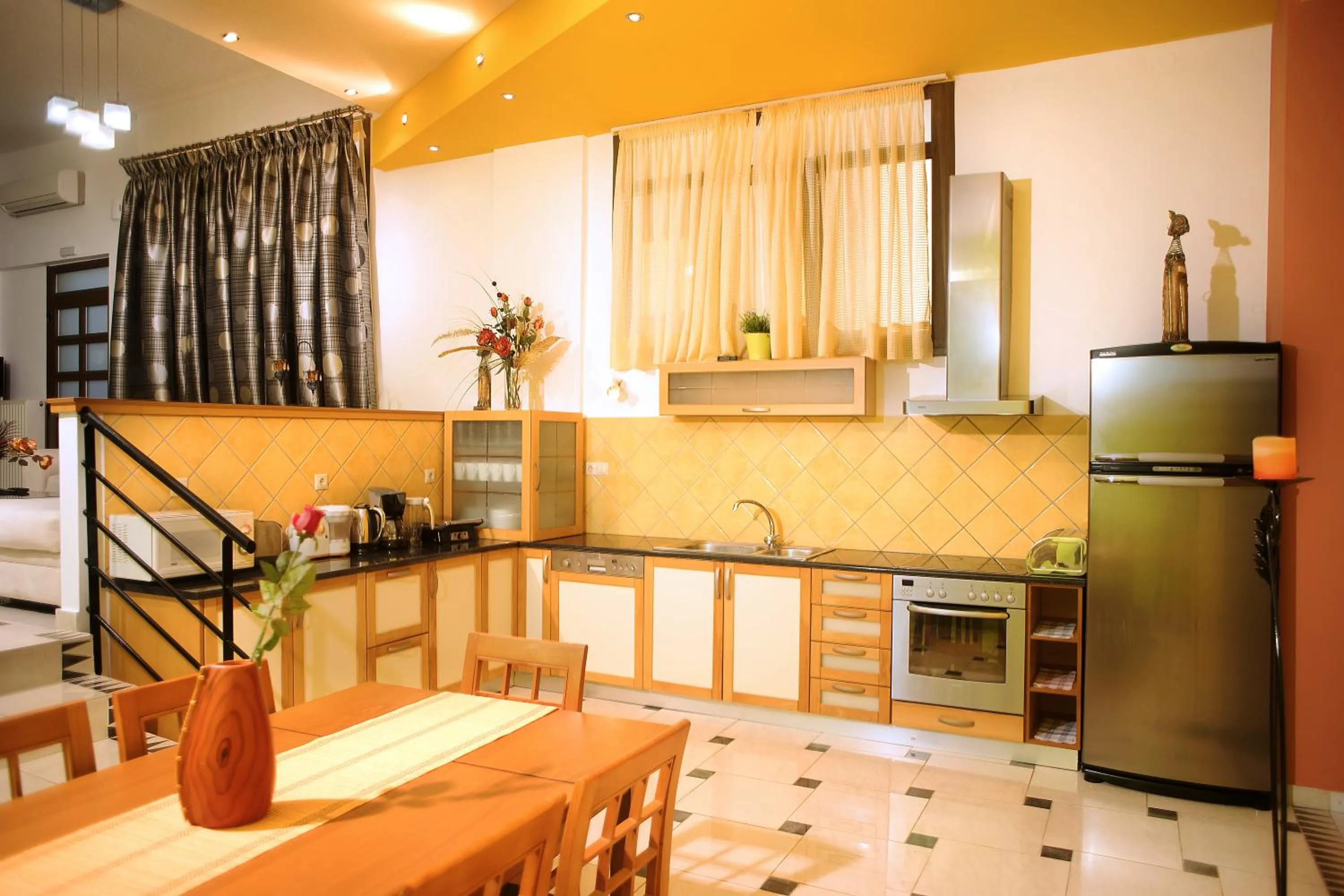 Kitchen or kitchenette in Mythos- Platanias- Hotel -Apts