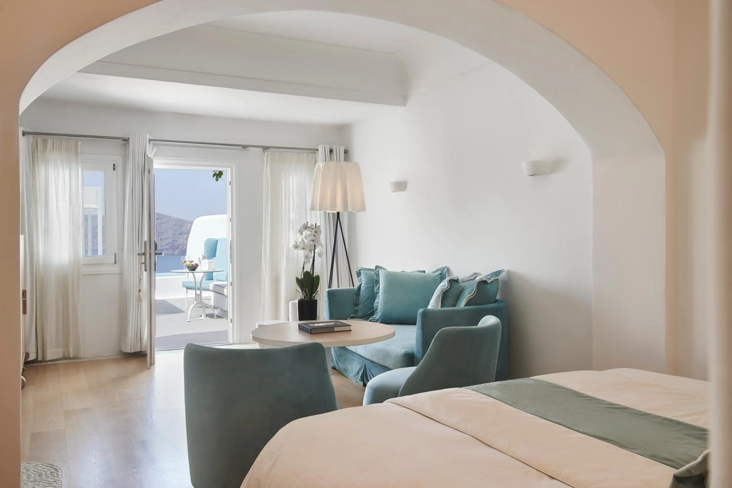 Photo of the whole room, Bed in Katikies Kirini Santorini - The Leading Hotels Of The World