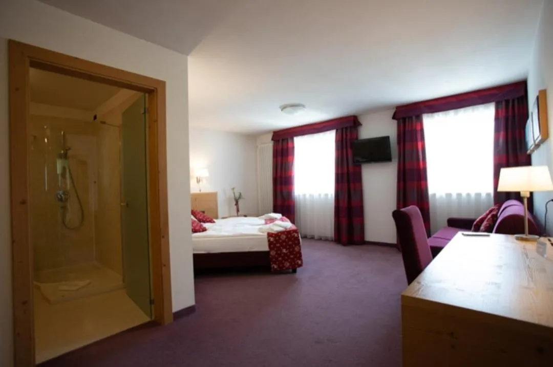 Bed in Ciasa Alpina Relax Hotel