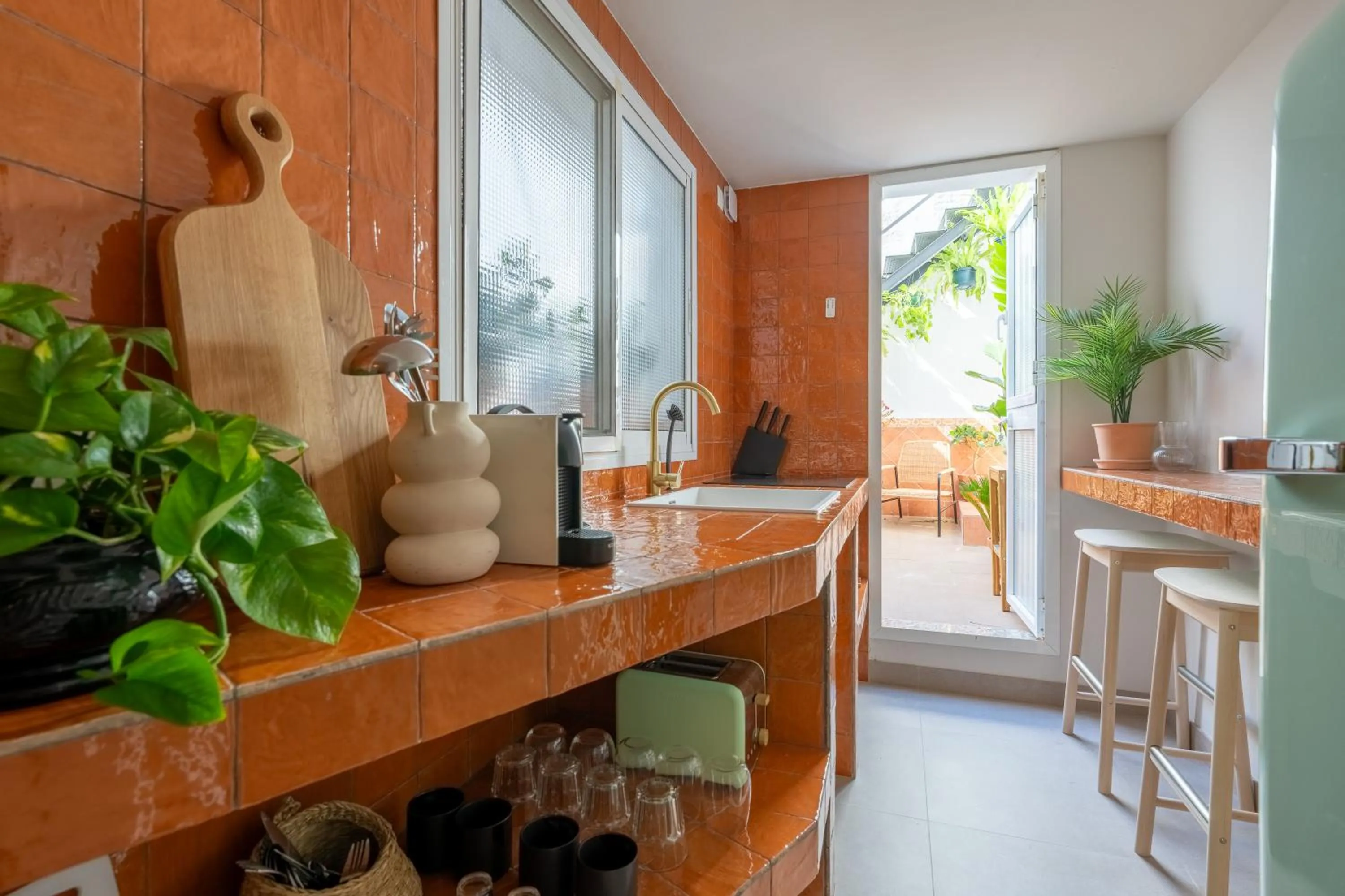 Kitchen or kitchenette in I AM La Posada Hotel and Apartment