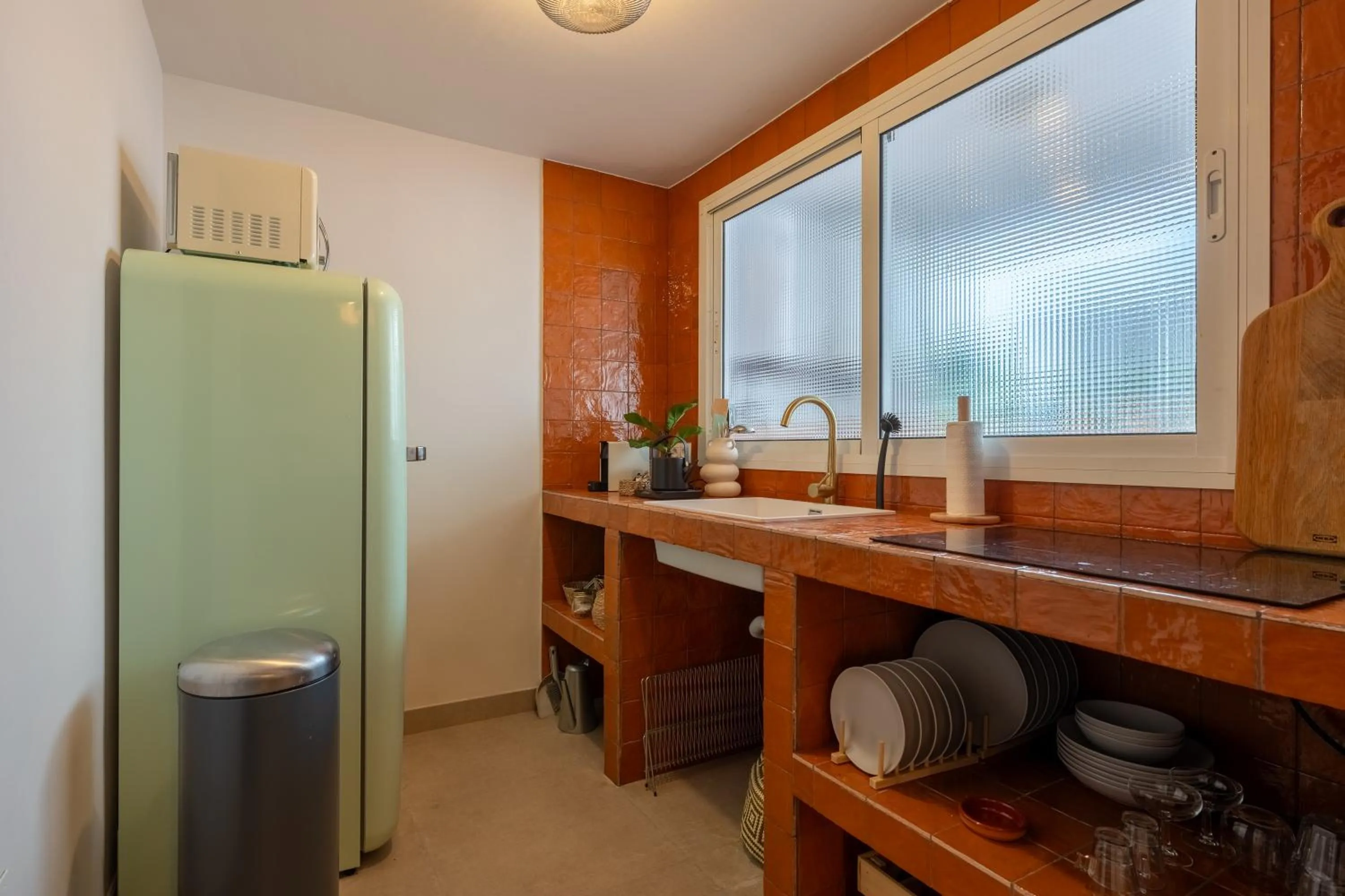 Kitchen or kitchenette in I AM La Posada Hotel and Apartment