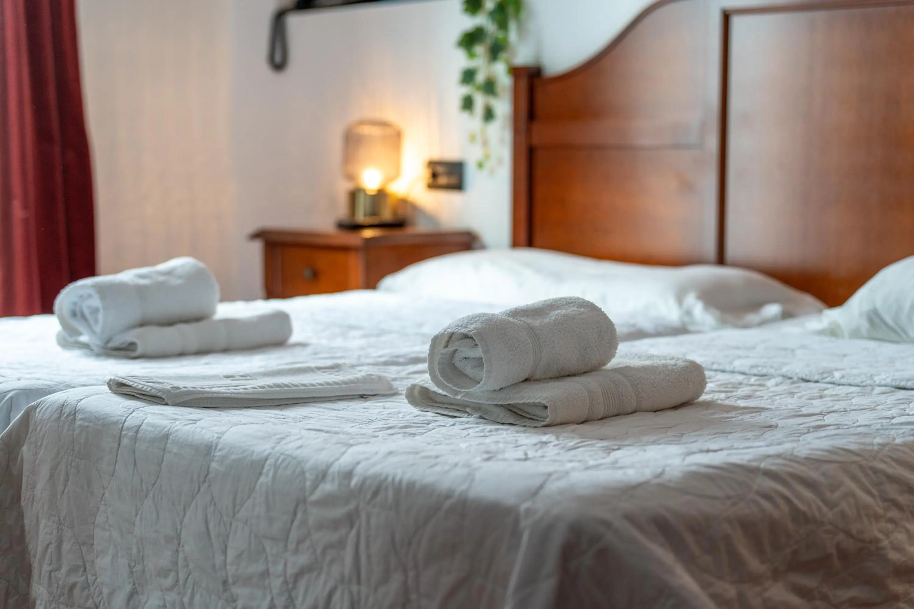 Bed in I AM La Posada Hotel and Apartment