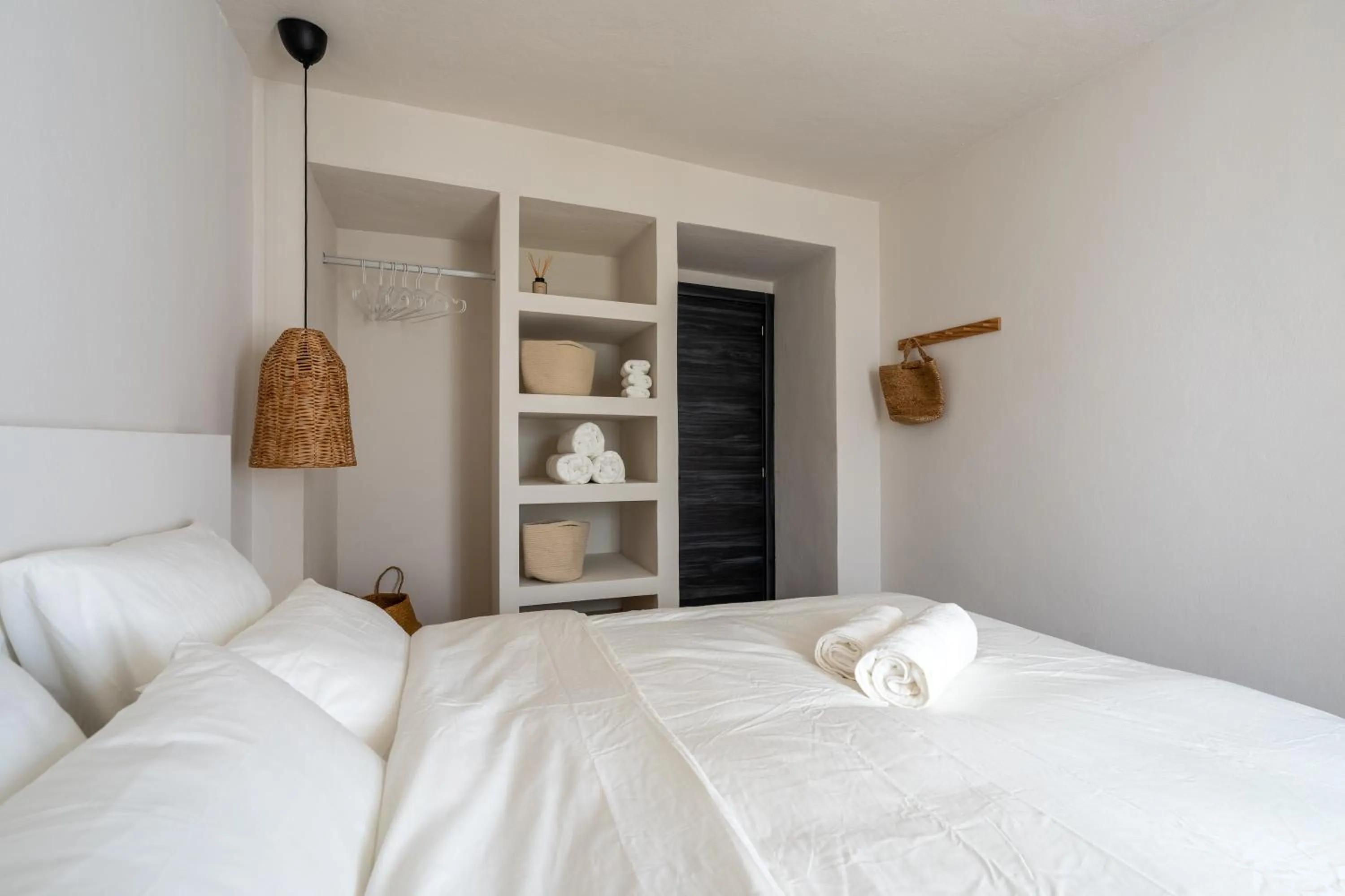 Bed in I AM La Posada Hotel and Apartment