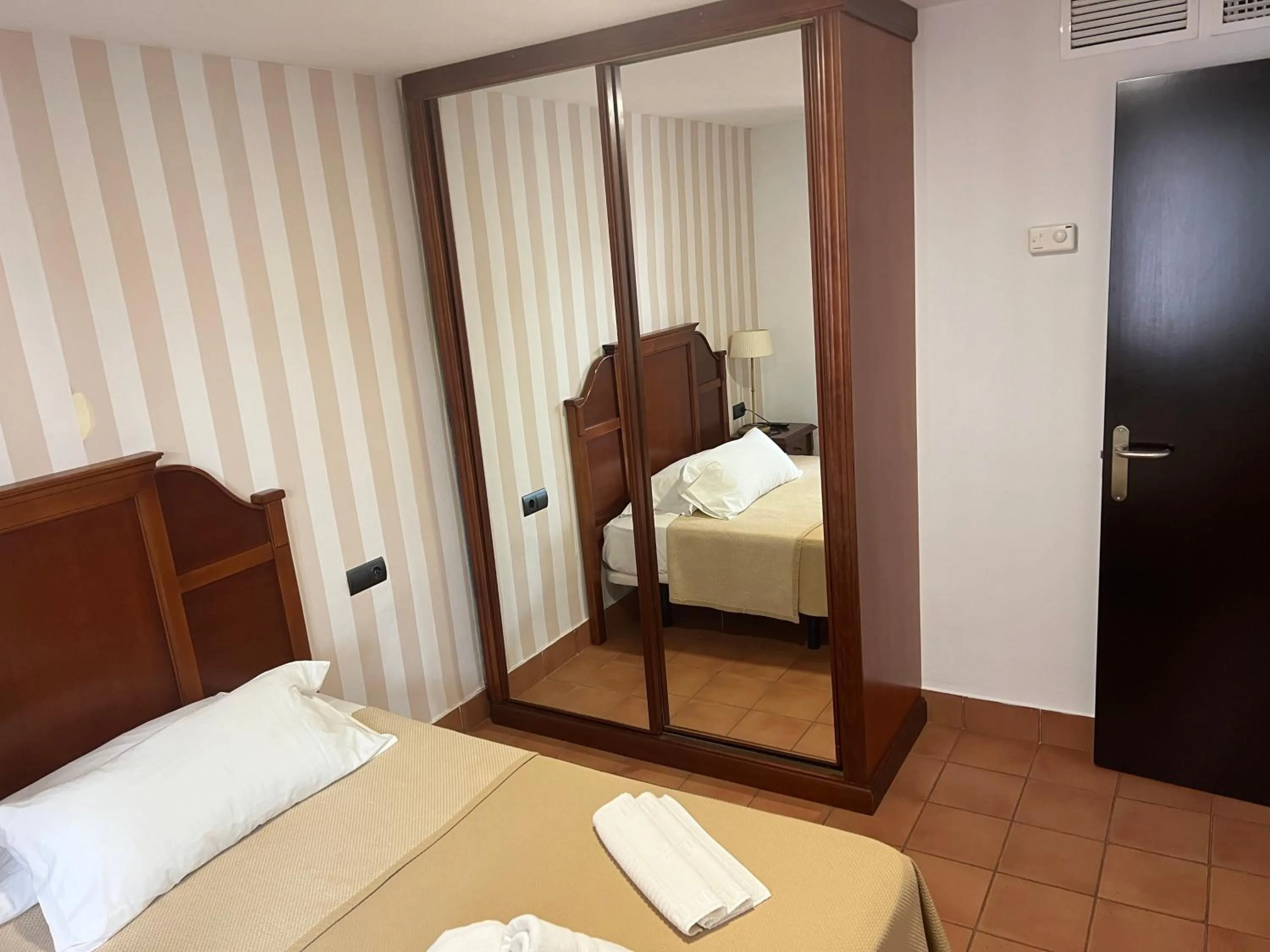 Bedroom, Bed in I AM La Posada Hotel and Apartment