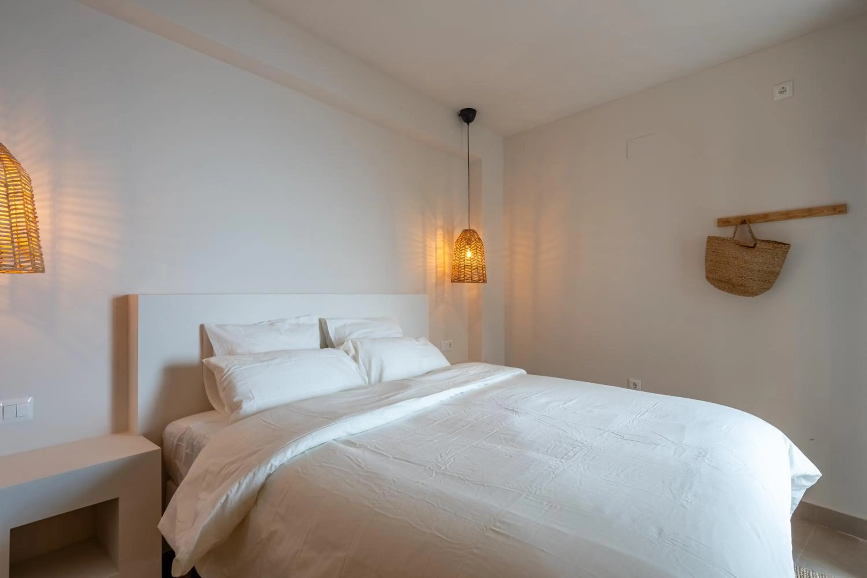 Bed in I AM La Posada Hotel and Apartment