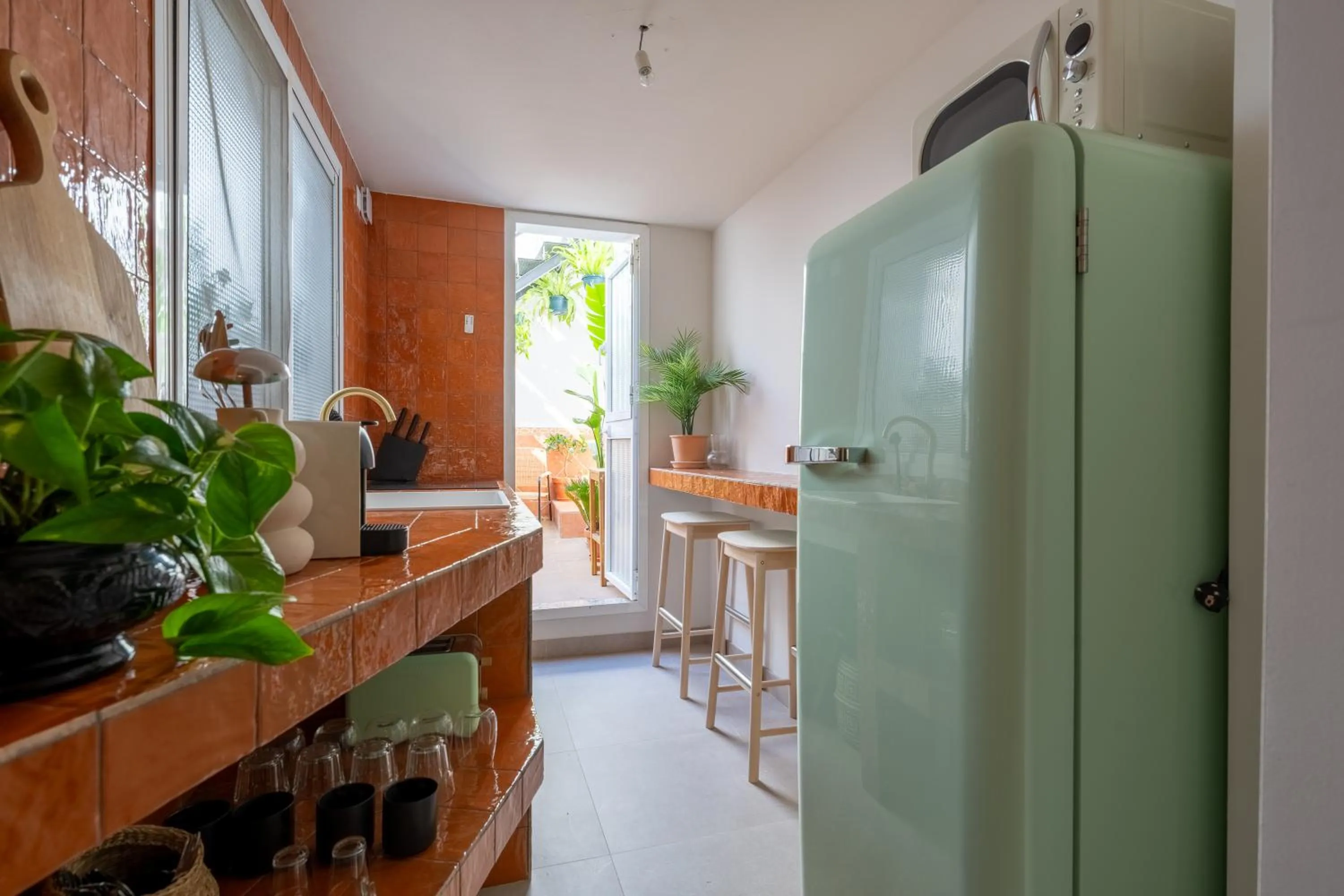 Kitchen or kitchenette in I AM La Posada Hotel and Apartment