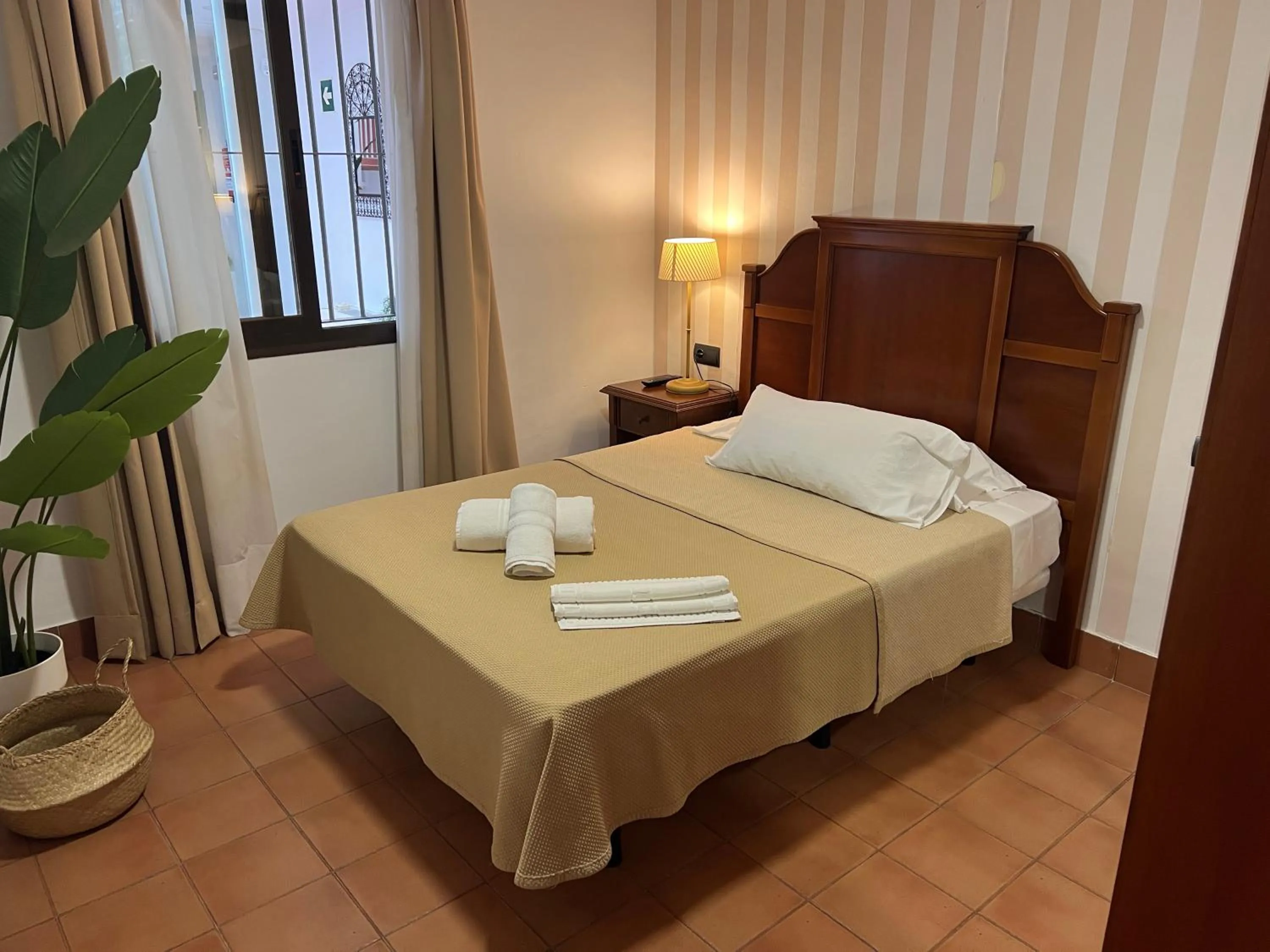 Bedroom, Bed in I AM La Posada Hotel and Apartment