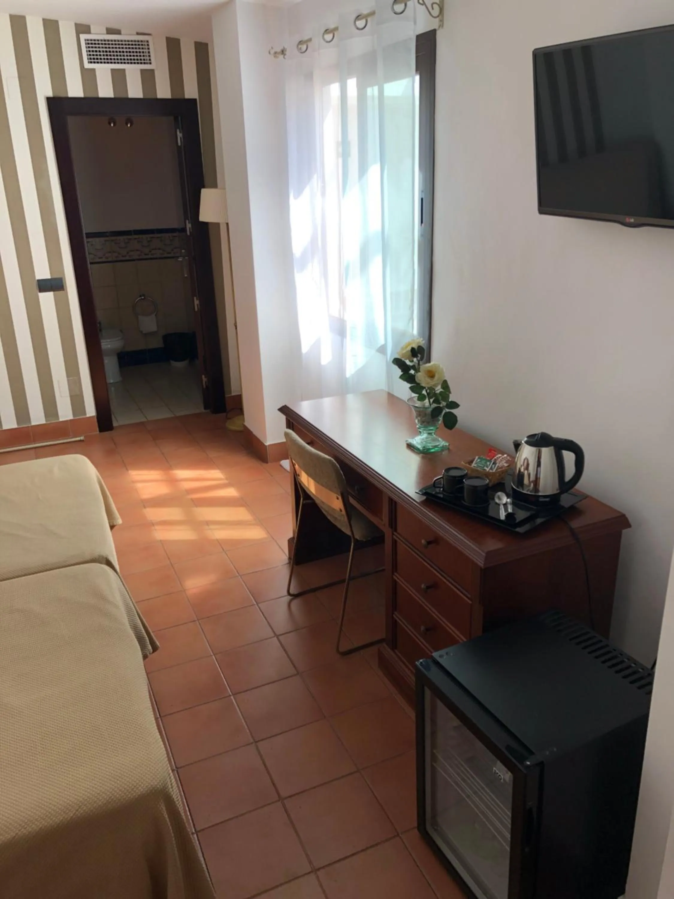 Bedroom, Bed in I AM La Posada Hotel and Apartment