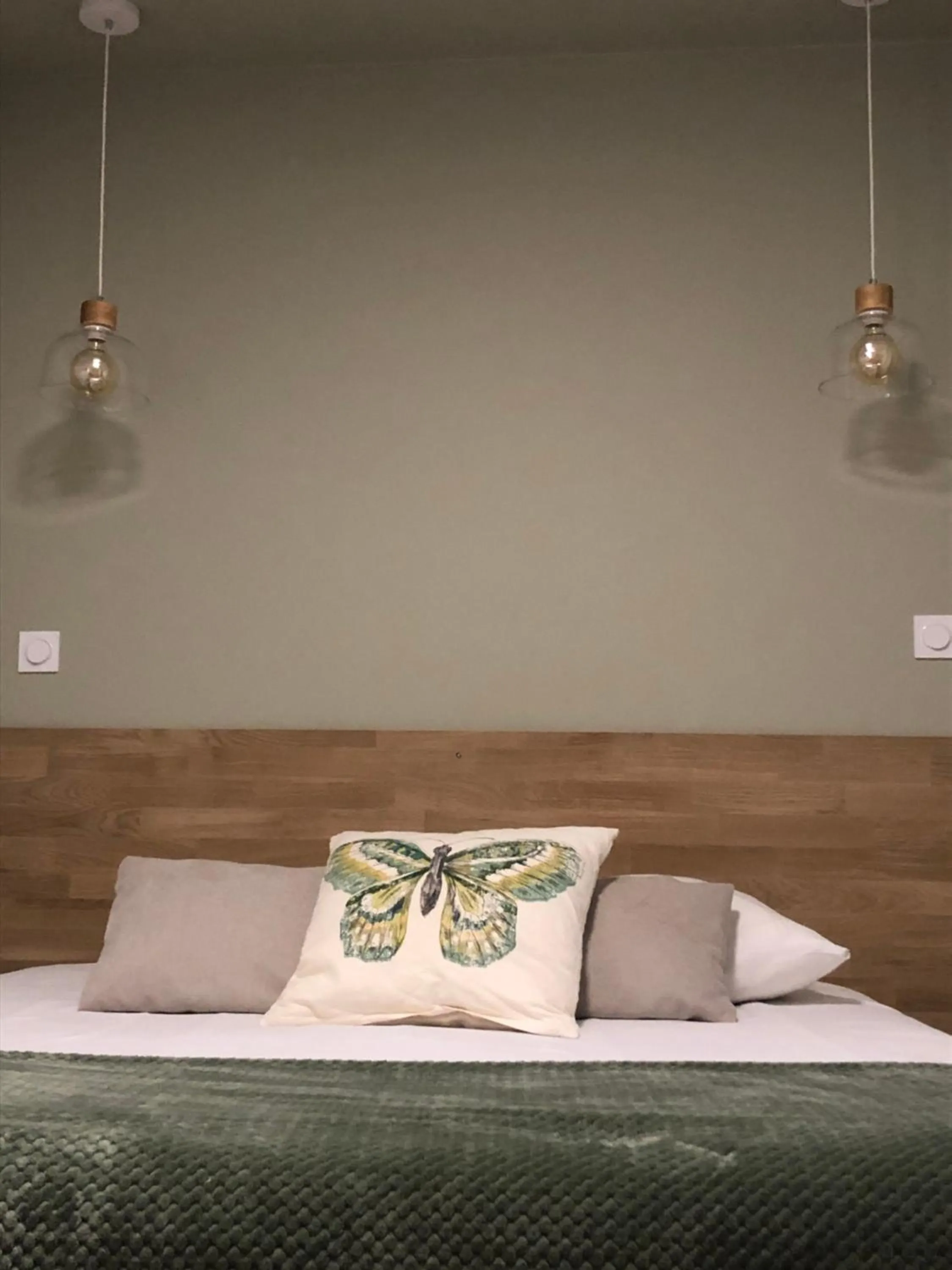 Bed in Logis Hôtel La Fenière