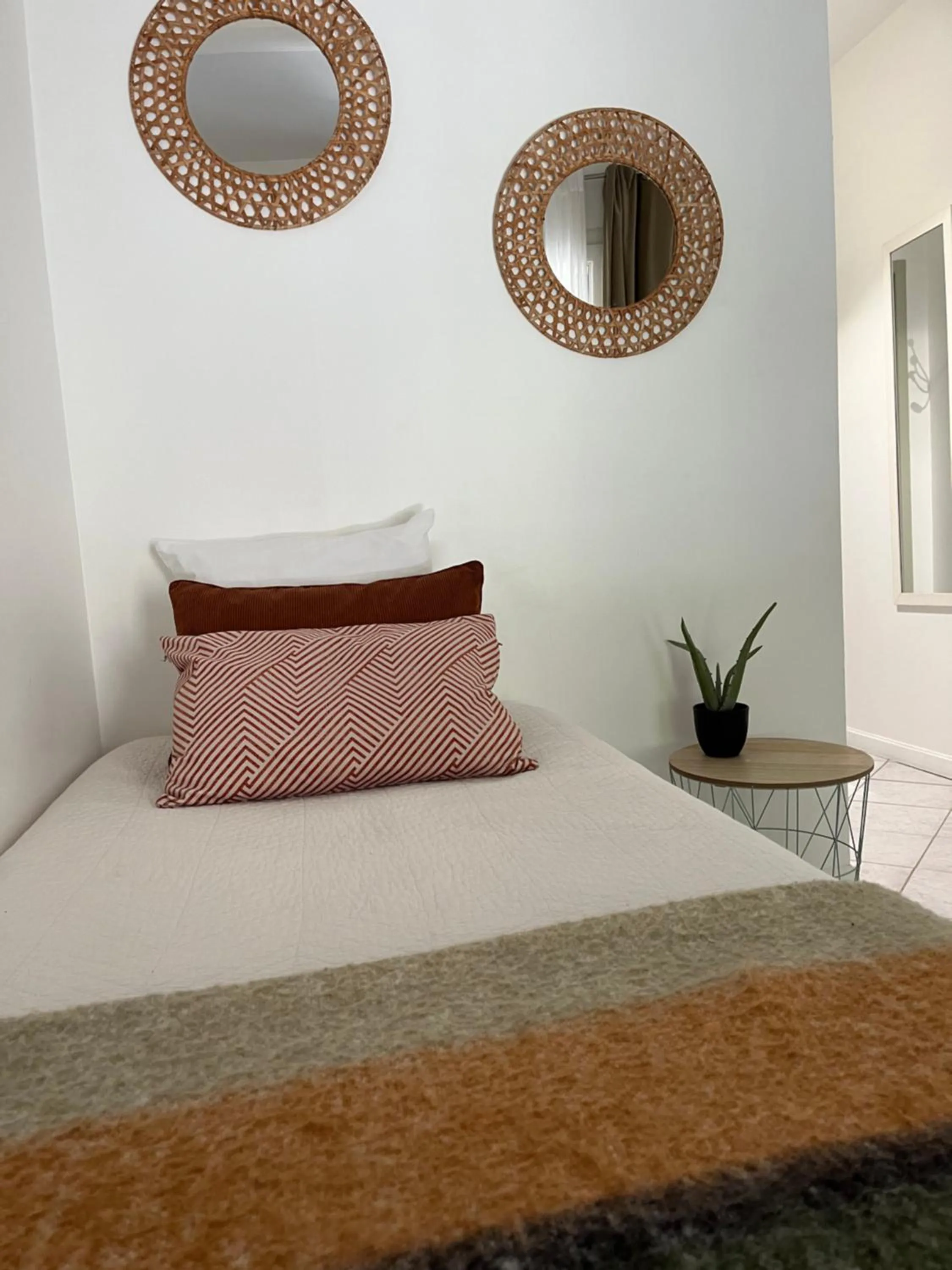 Bed in Logis Hôtel La Fenière