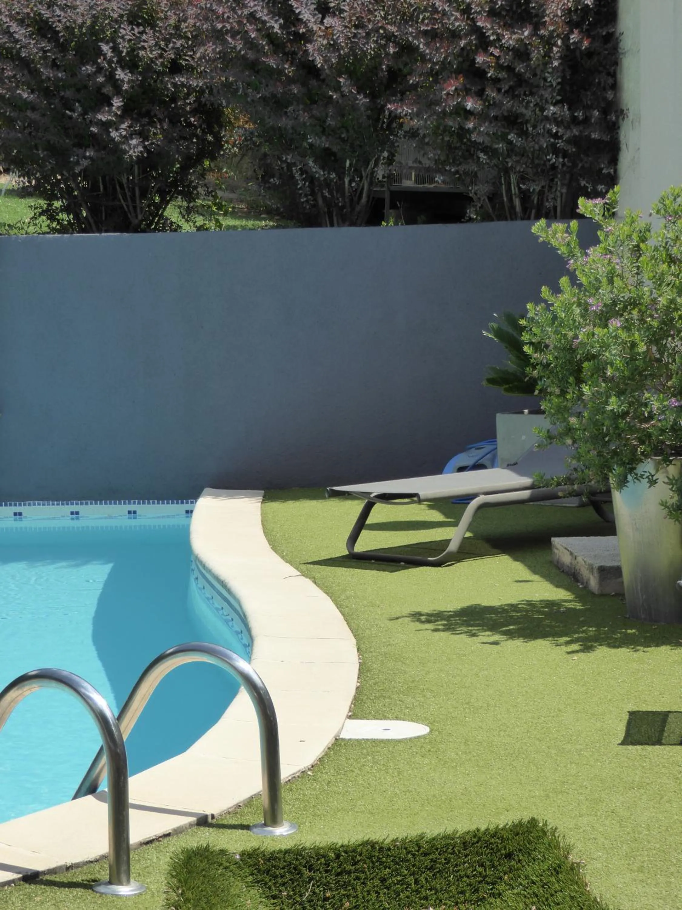 Garden in Logis Hôtel La Fenière