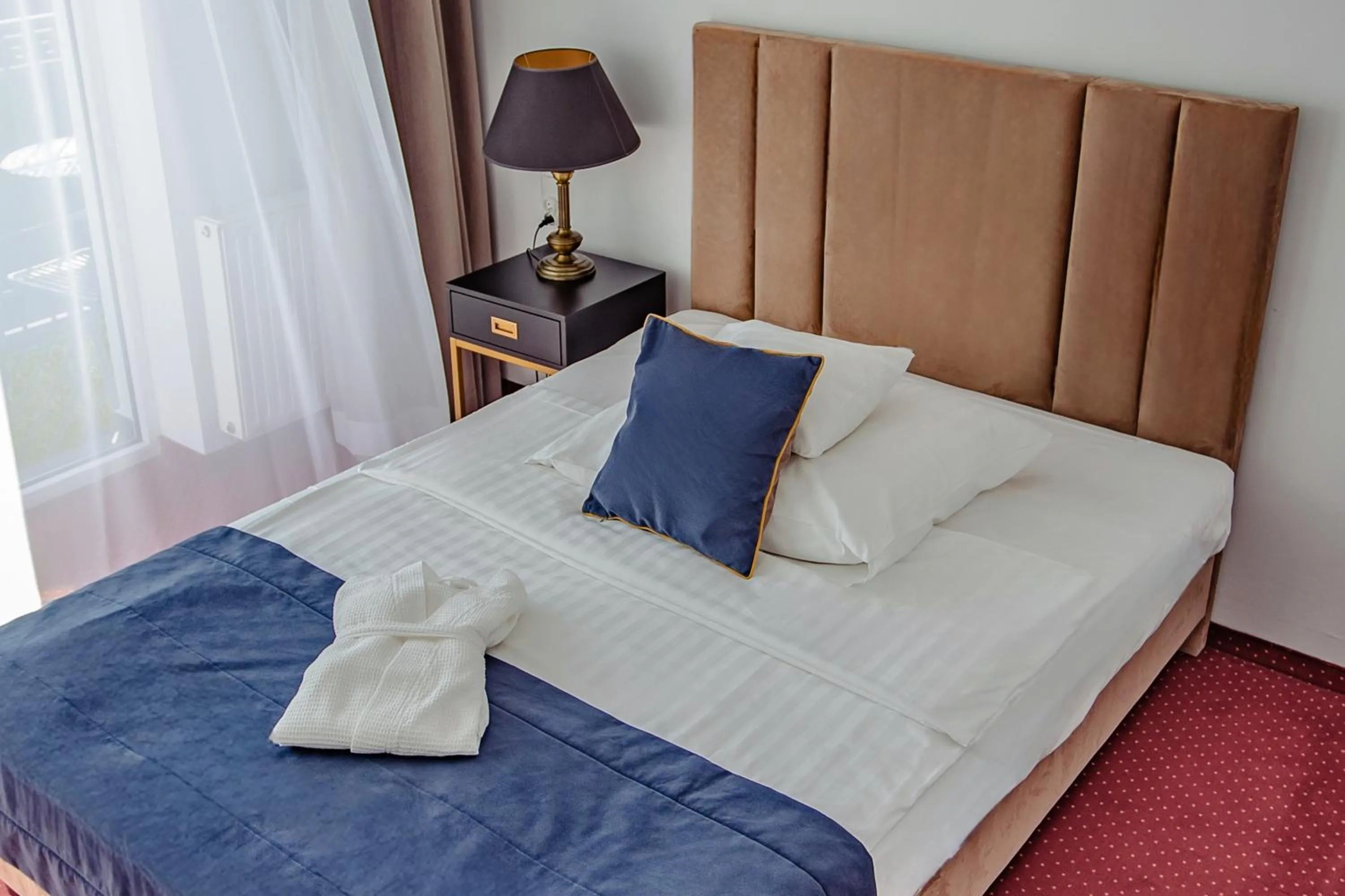 Bed in Prawdzic Family Resort & Wellness