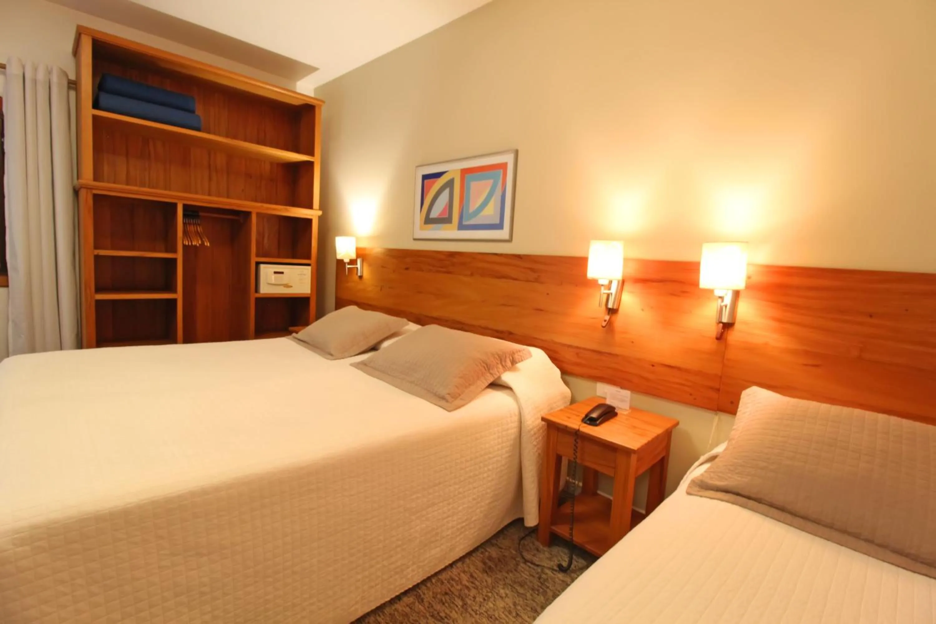 Bed in Pousada Villa Capivary Campos do Jordão